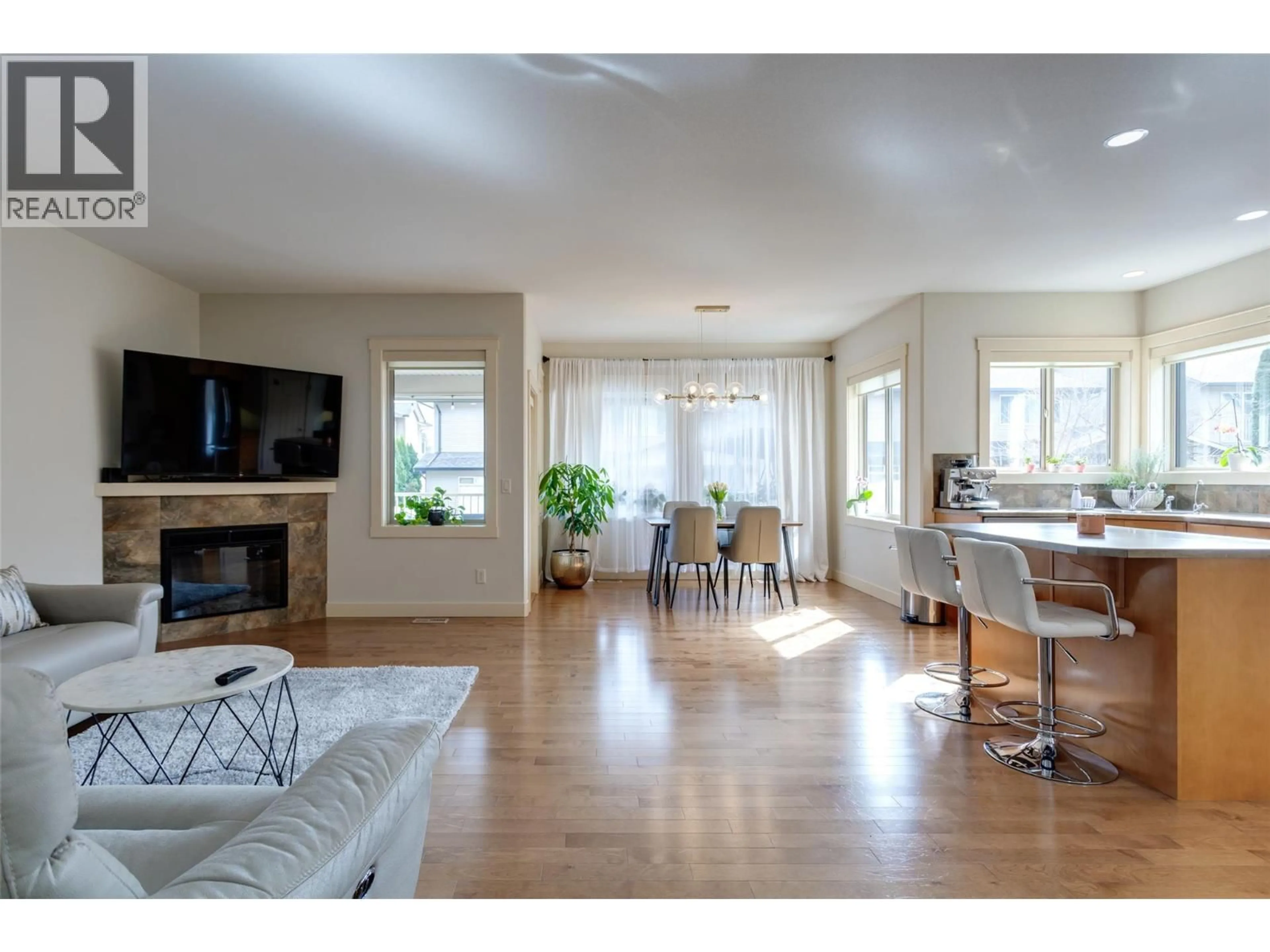 Living room with furniture, wood/laminate floor for 2841 BENTLEY ROAD, West Kelowna British Columbia V4T3B2