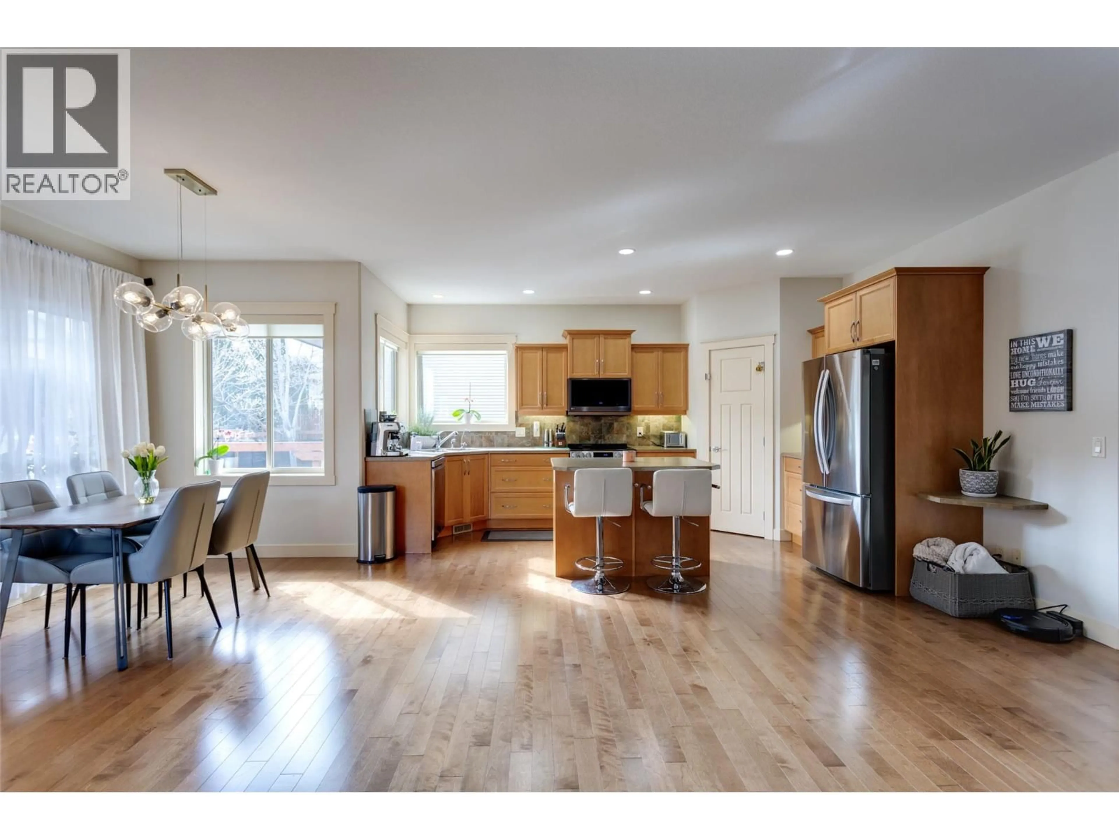 Open concept kitchen, wood/laminate floor for 2841 BENTLEY ROAD, West Kelowna British Columbia V4T3B2