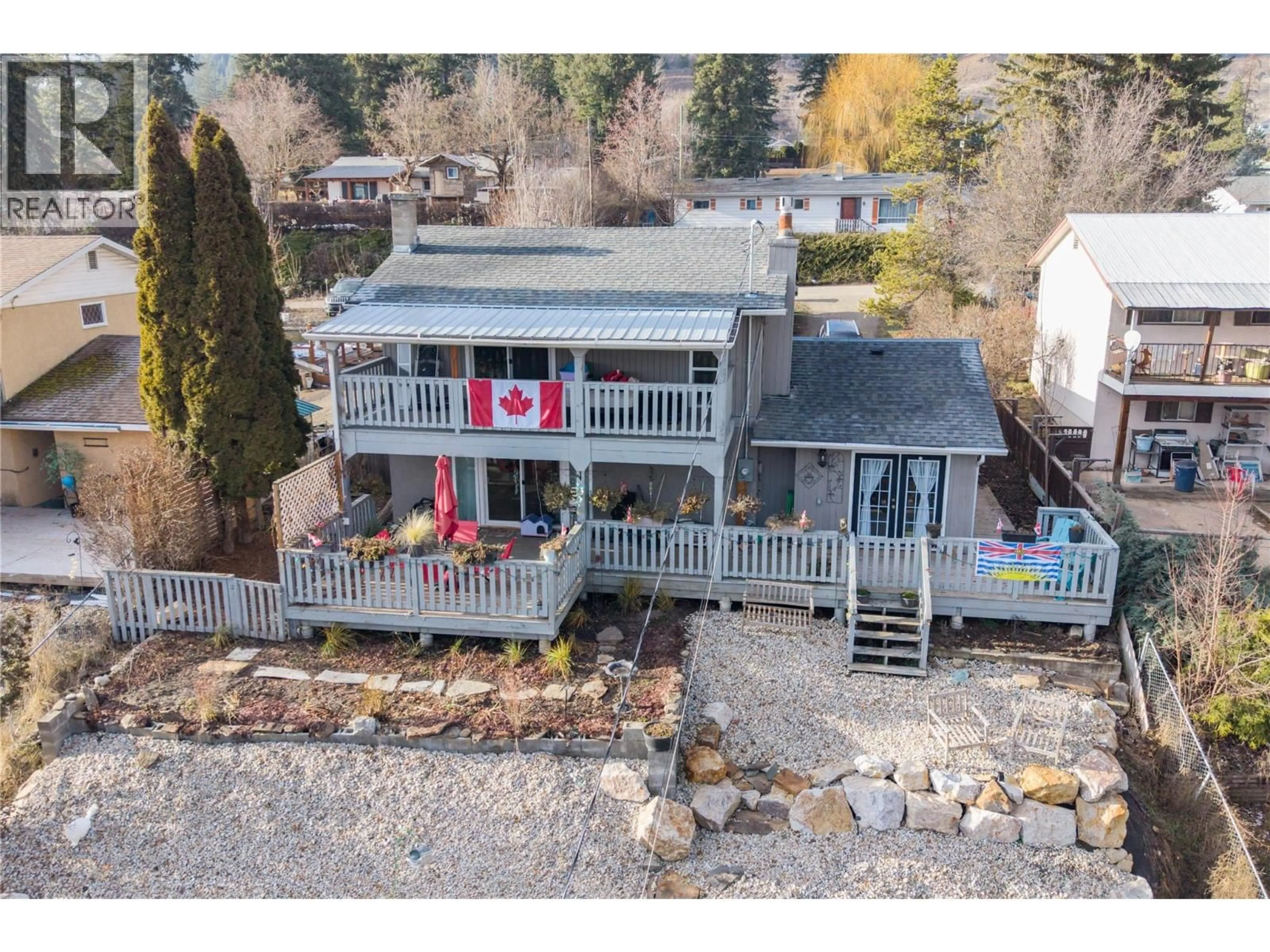 A pic from outside/outdoor area/front of a property/back of a property/a pic from drone, water/lake/river/ocean view for 2138 CATT AVENUE, Lumby British Columbia V0E2G0