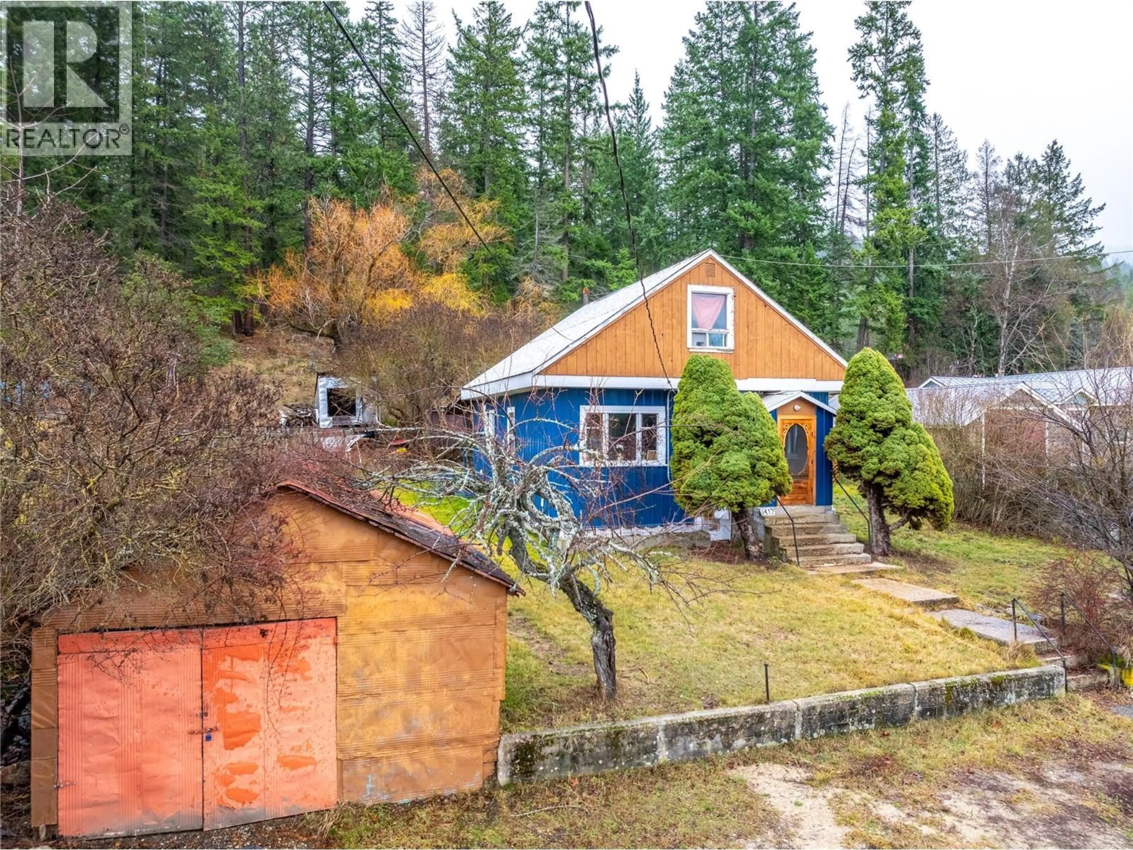 A pic from outside/outdoor area/front of a property/back of a property/a pic from drone, water/lake/river/ocean view for 1412 AINSWORTH AVENUE, Riondel British Columbia V0B2B0