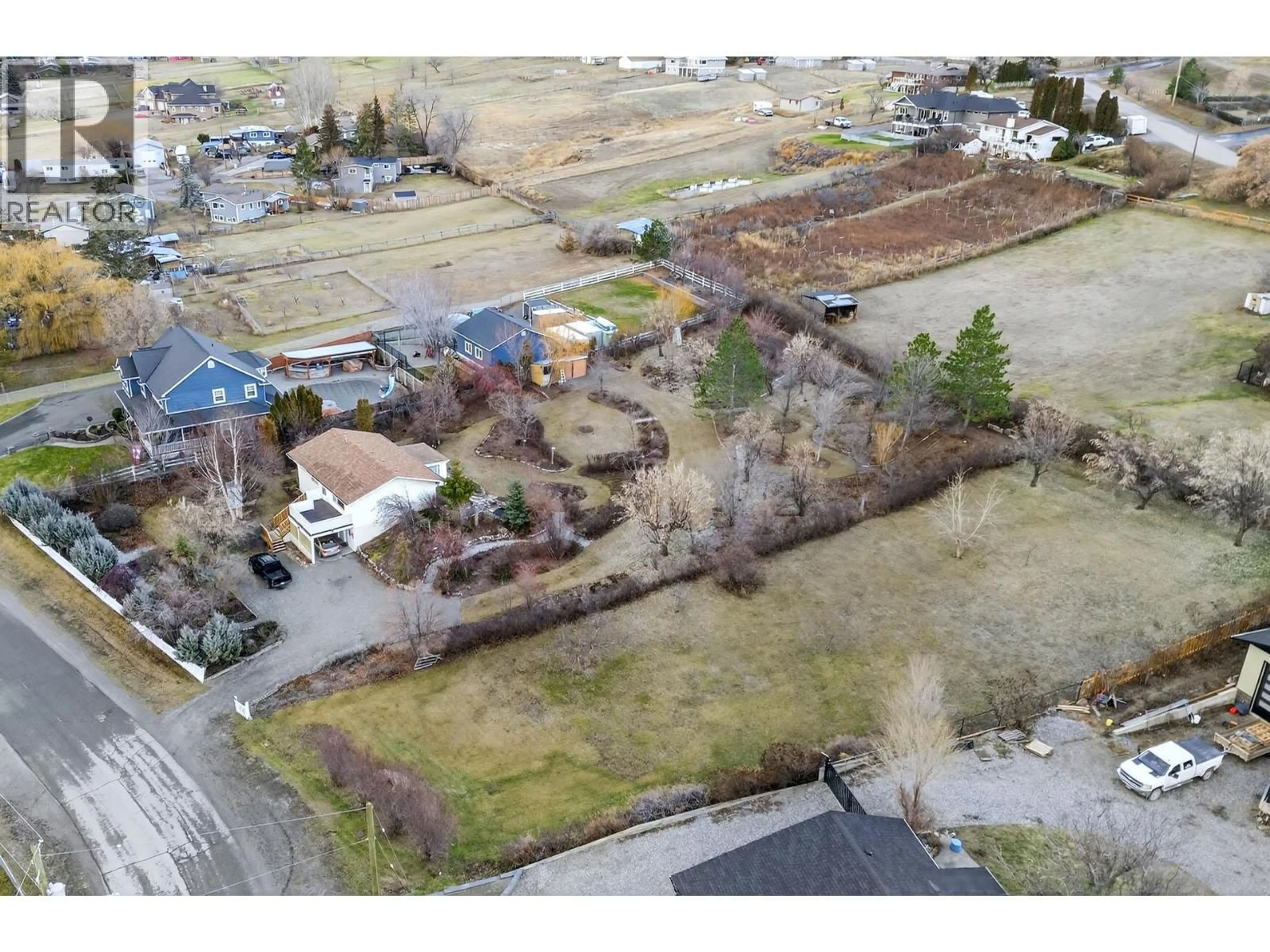 A pic from outside/outdoor area/front of a property/back of a property/a pic from drone, street for 6105 MEADOWLAND CRESCENT NORTH, Kamloops British Columbia V2C5J1