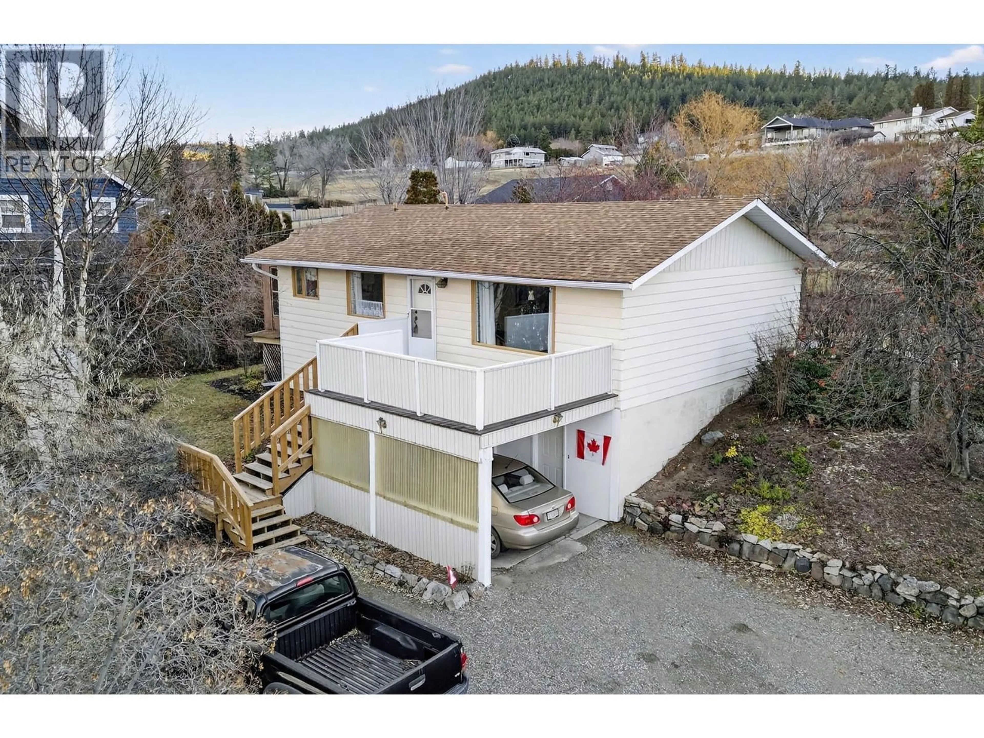 A pic from outside/outdoor area/front of a property/back of a property/a pic from drone, mountain view for 6105 MEADOWLAND CRESCENT NORTH, Kamloops British Columbia V2C5J1