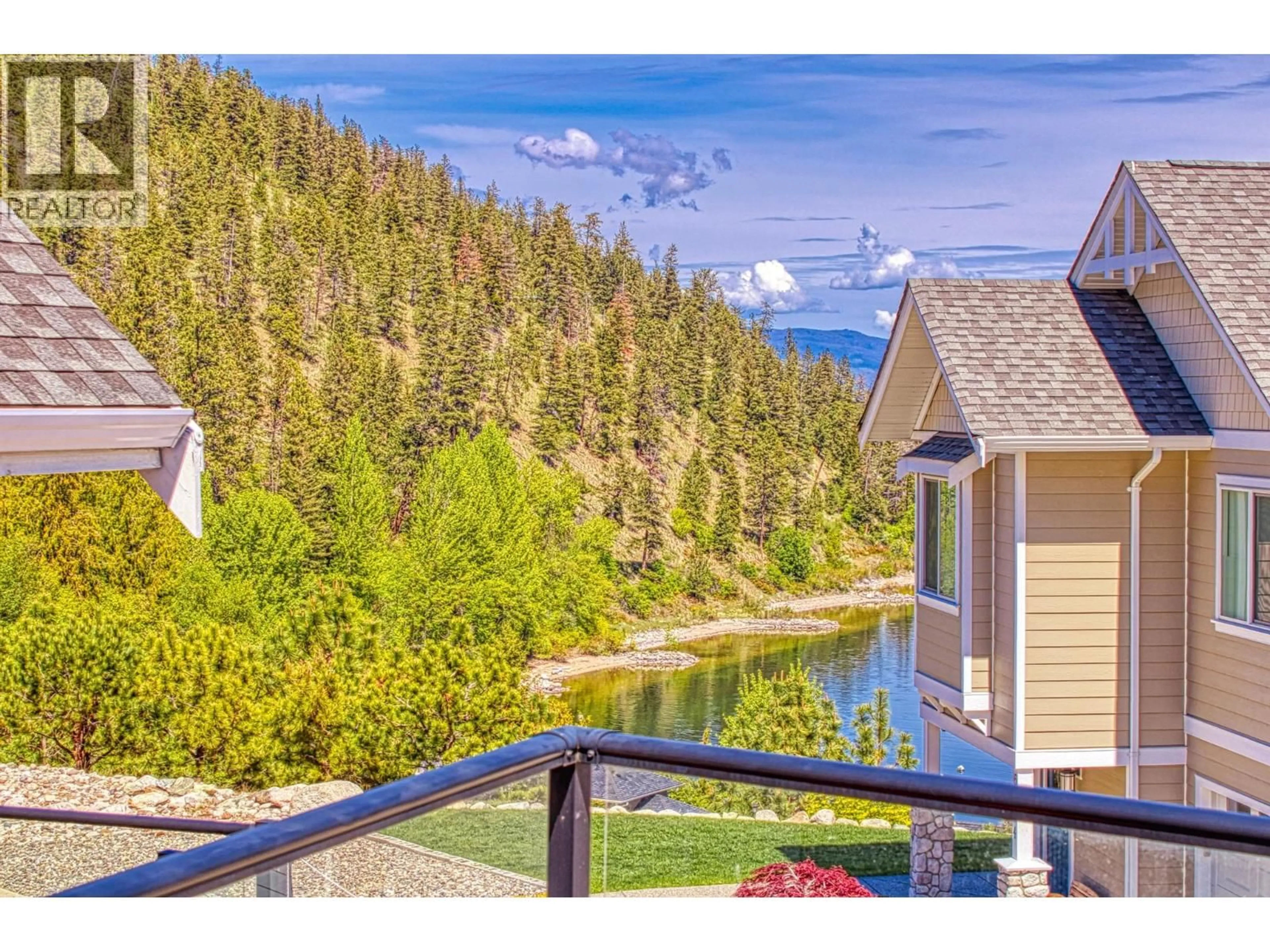 A pic from outside/outdoor area/front of a property/back of a property/a pic from drone, water/lake/river/ocean view for 33 - 7001 BARCELONA DRIVE, Kelowna British Columbia V1Z3R8