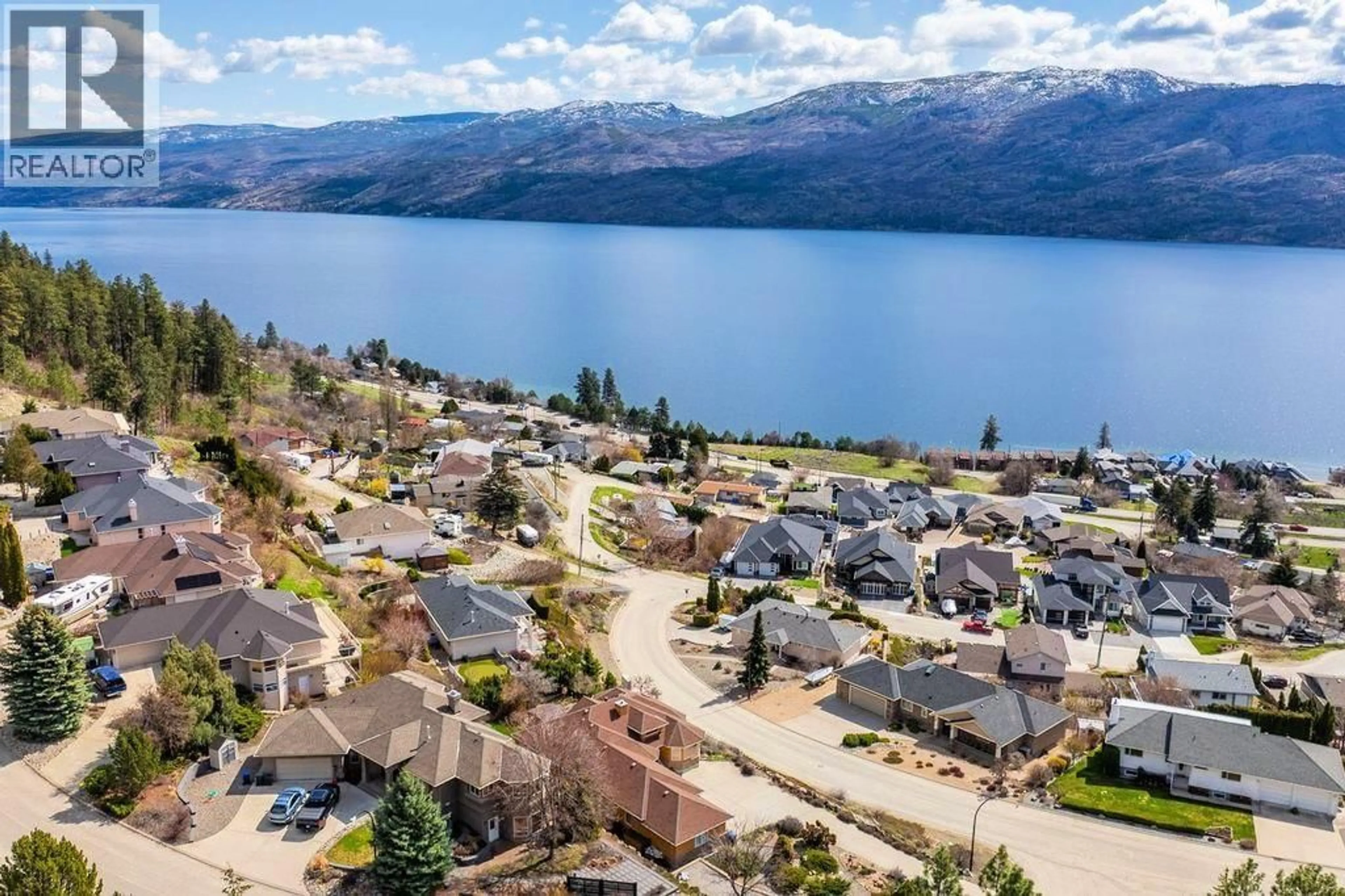 A pic from outside/outdoor area/front of a property/back of a property/a pic from drone, water/lake/river/ocean view for 5205 MACNEILL COURT, Peachland British Columbia V0H1X2