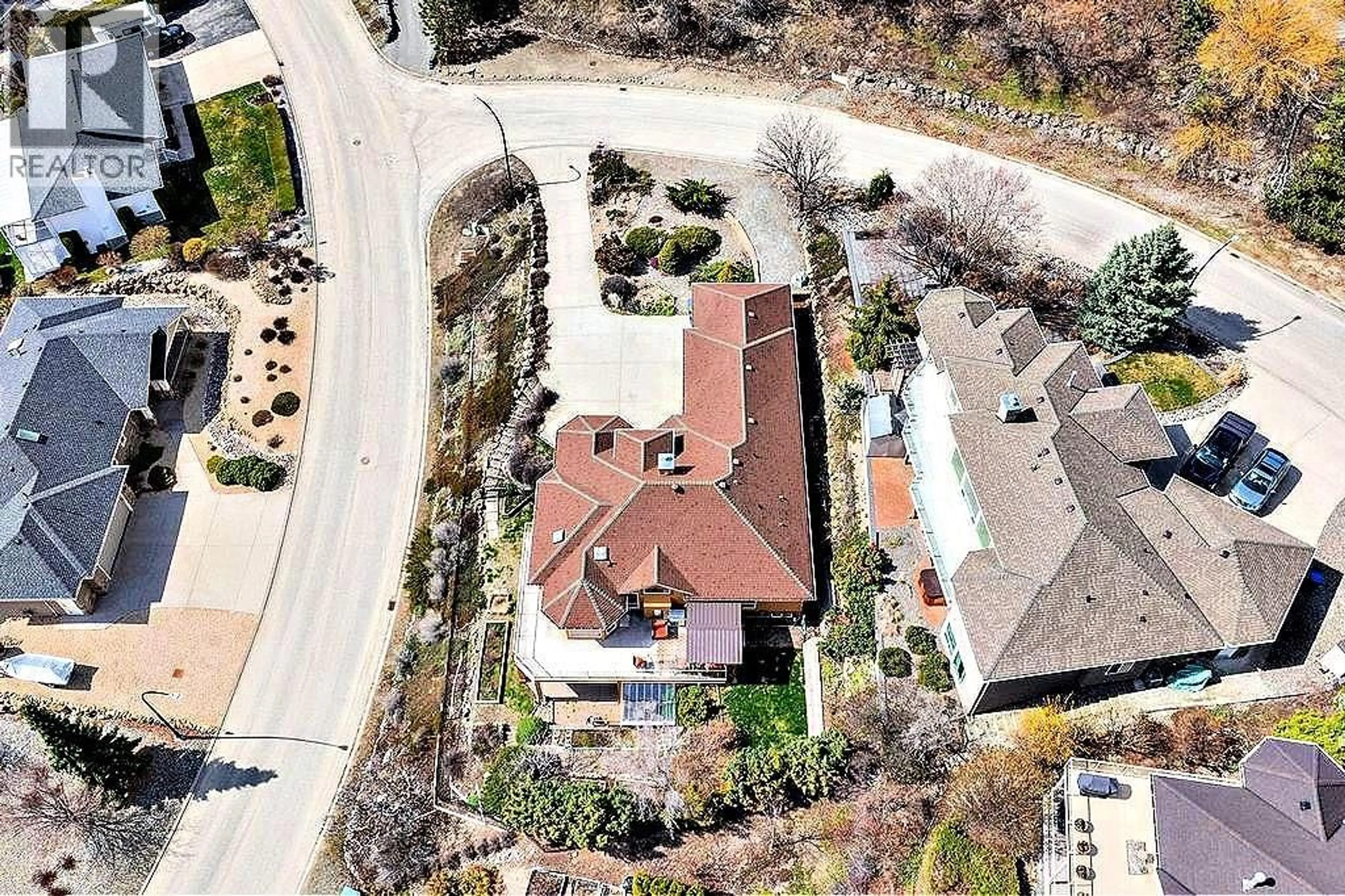 A pic from outside/outdoor area/front of a property/back of a property/a pic from drone, street for 5205 MACNEILL COURT, Peachland British Columbia V0H1X2