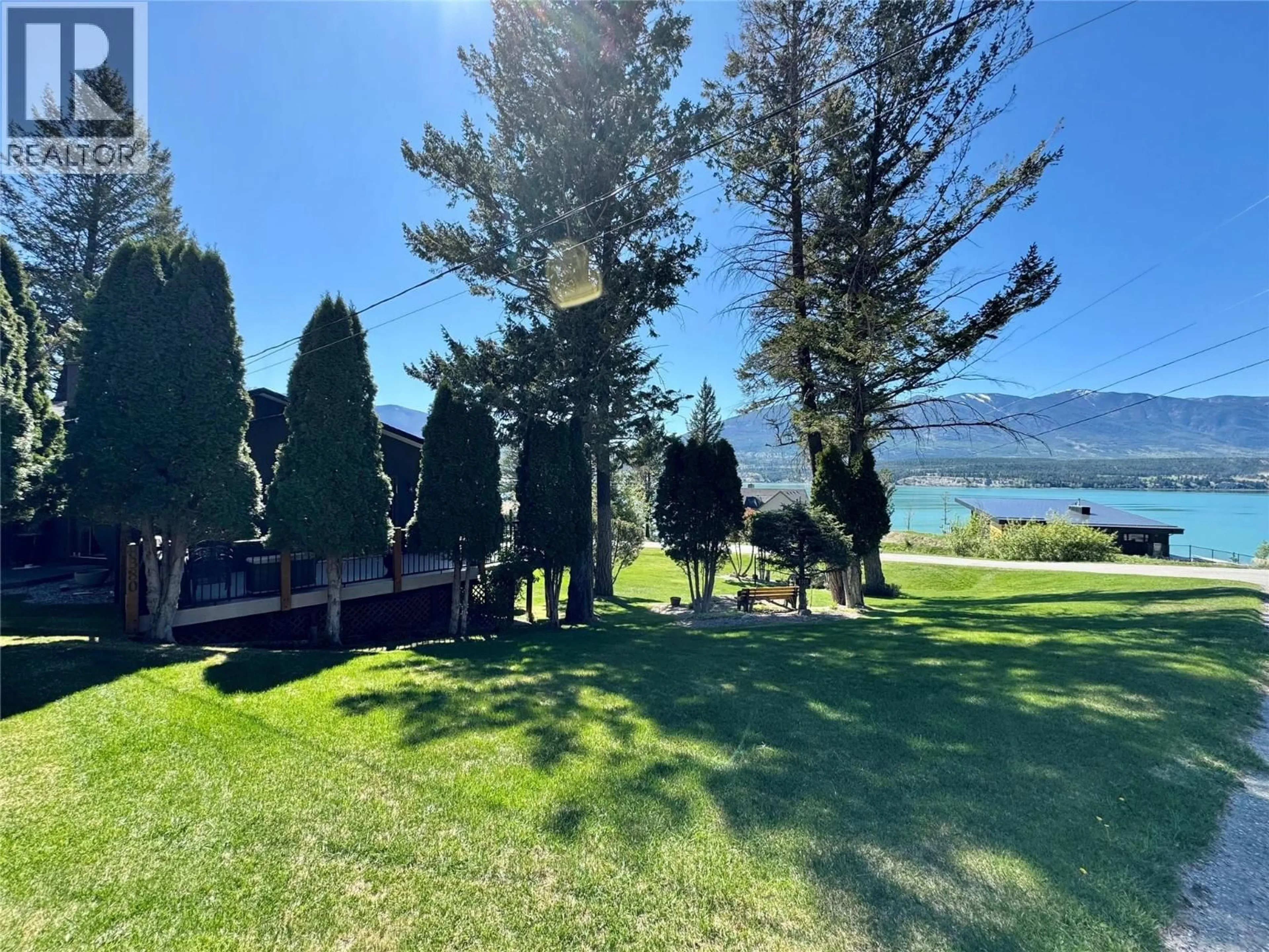 A pic from outside/outdoor area/front of a property/back of a property/a pic from drone, water/lake/river/ocean view for 8380 RICHARDSON CRESCENT, Canal Flats British Columbia V0B1B0