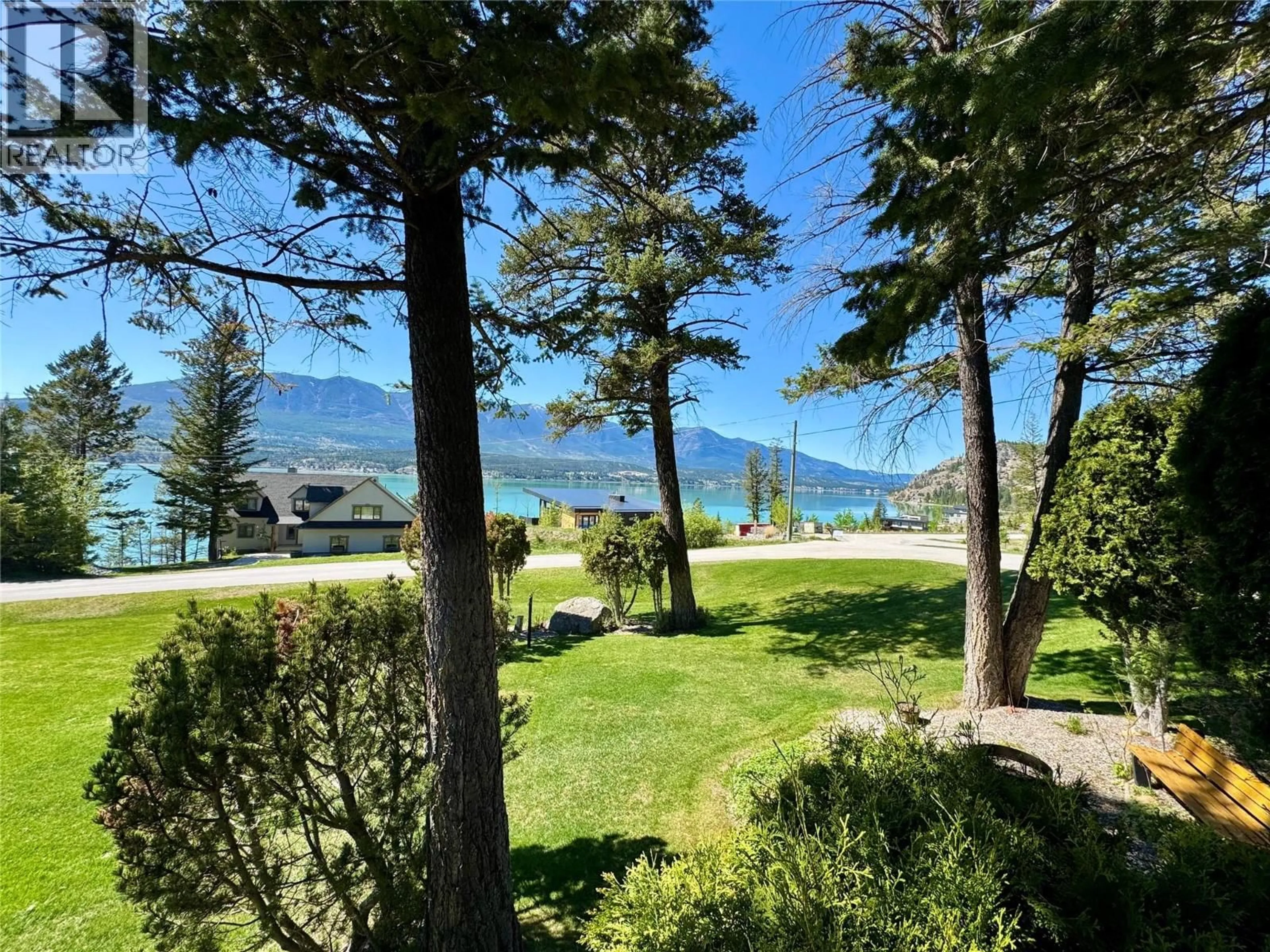 A pic from outside/outdoor area/front of a property/back of a property/a pic from drone, water/lake/river/ocean view for 8380 RICHARDSON CRESCENT, Canal Flats British Columbia V0B1B0