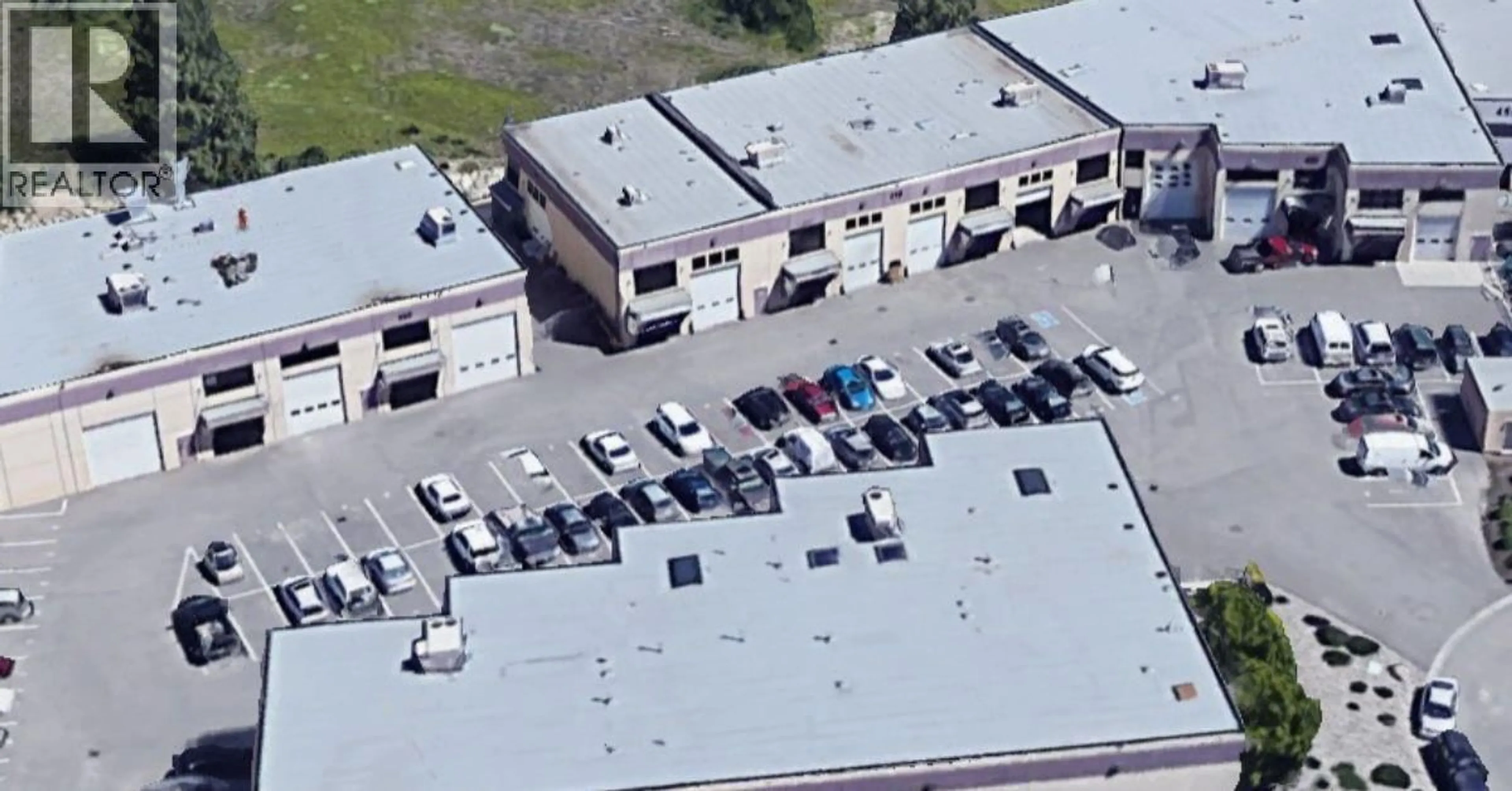 A pic from outside/outdoor area/front of a property/back of a property/a pic from drone, building for 102 - 460 NAEVE COURT, Kelowna British Columbia V1V2M2