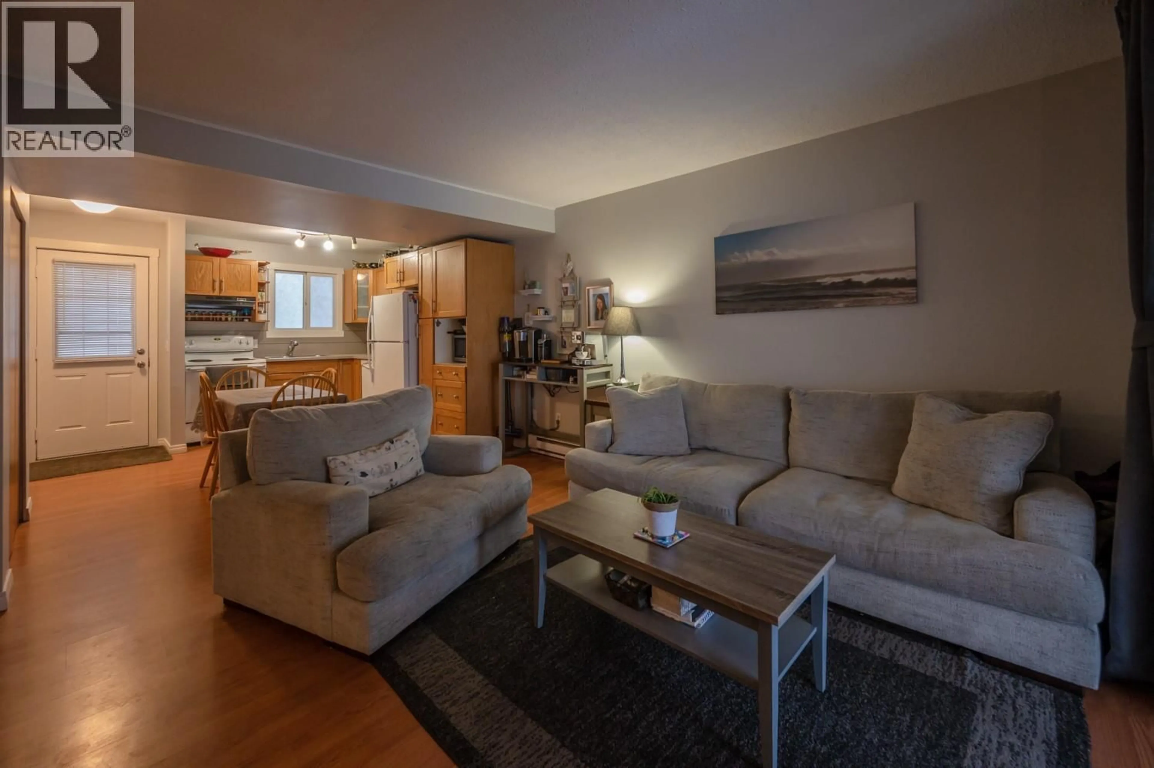 Living room with furniture, wood/laminate floor for 43 - 2250 BASKIN STREET, Penticton British Columbia V2A6Y3