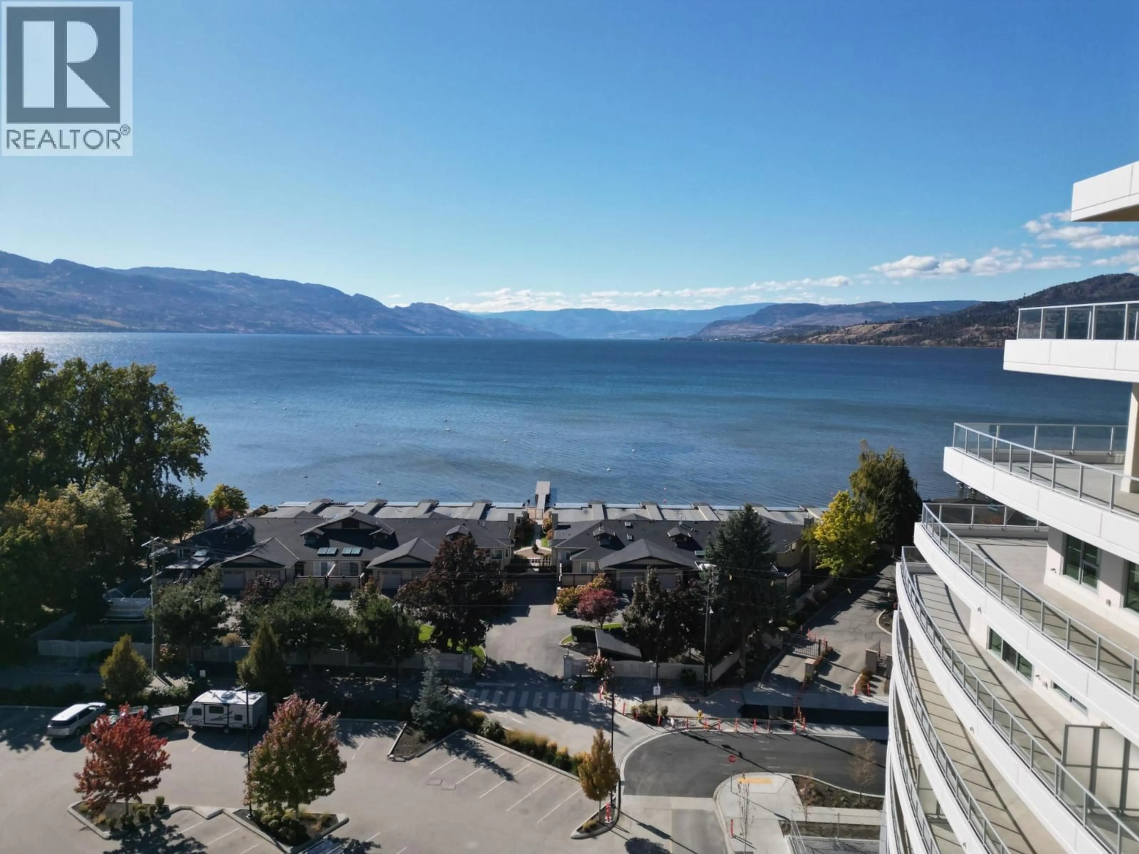 A pic from outside/outdoor area/front of a property/back of a property/a pic from drone, water/lake/river/ocean view for 503 - 3340 LAKESHORE ROAD, Kelowna British Columbia V1W0H6