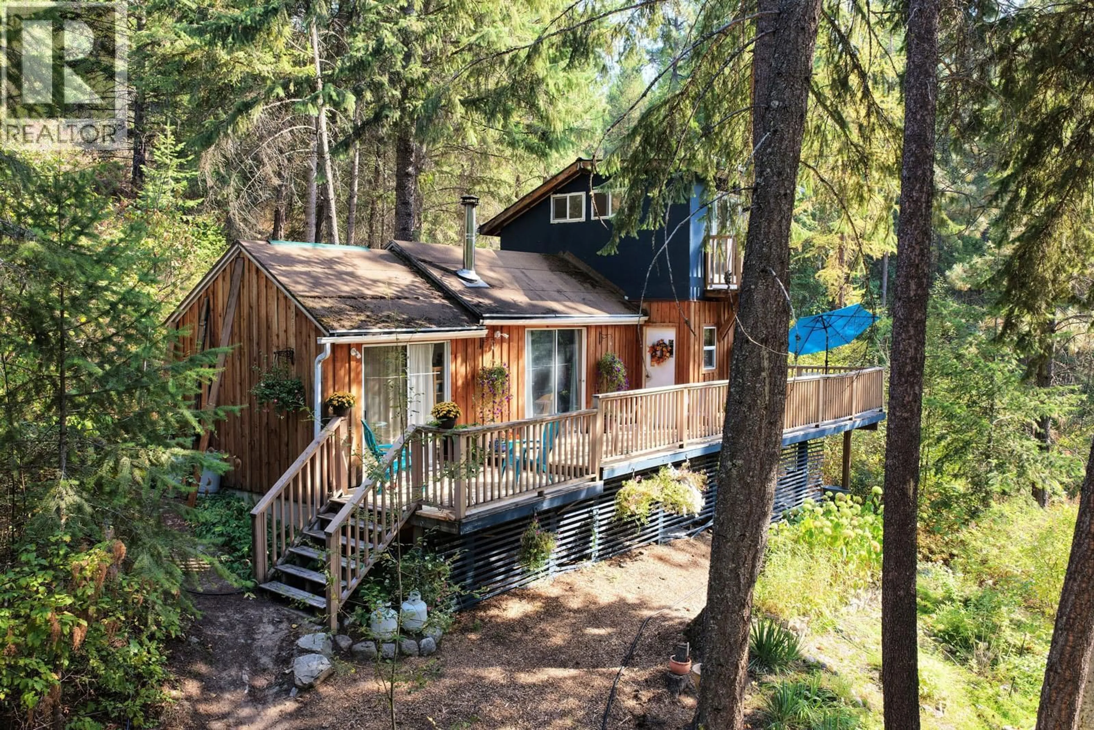 A pic from outside/outdoor area/front of a property/back of a property/a pic from drone, forest/trees view for 12540 NORTH FORK ROAD, Grand Forks British Columbia V0H1H1