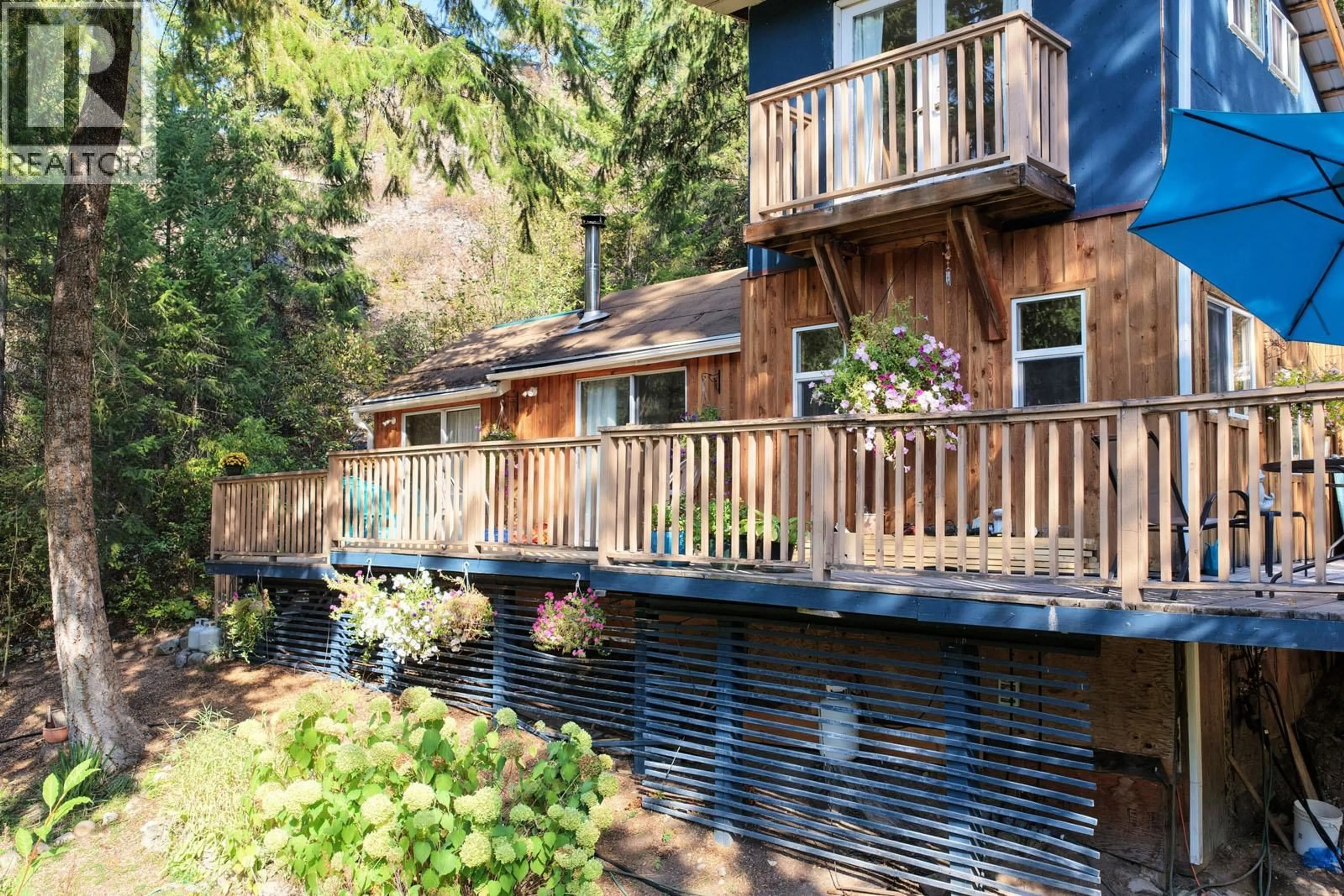 A pic from outside/outdoor area/front of a property/back of a property/a pic from drone, water/lake/river/ocean view for 12540 NORTH FORK ROAD, Grand Forks British Columbia V0H1H1