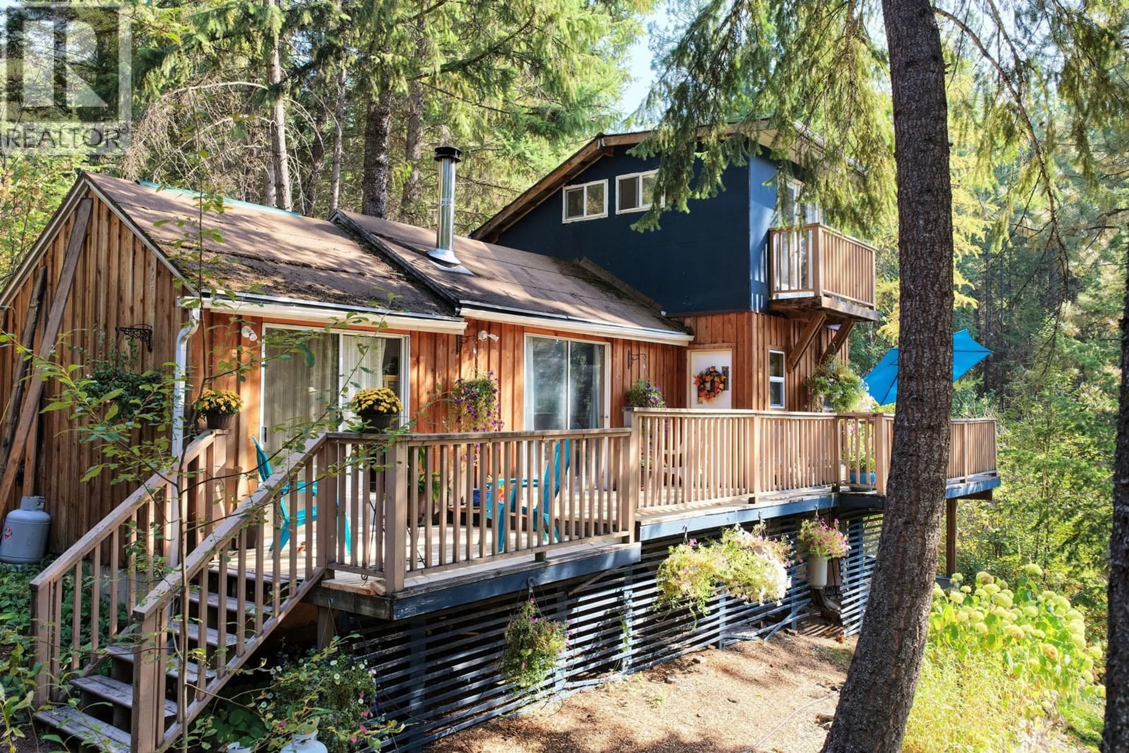 Home with vinyl exterior material, forest/trees view for 12540 NORTH FORK ROAD, Grand Forks British Columbia V0H1H1