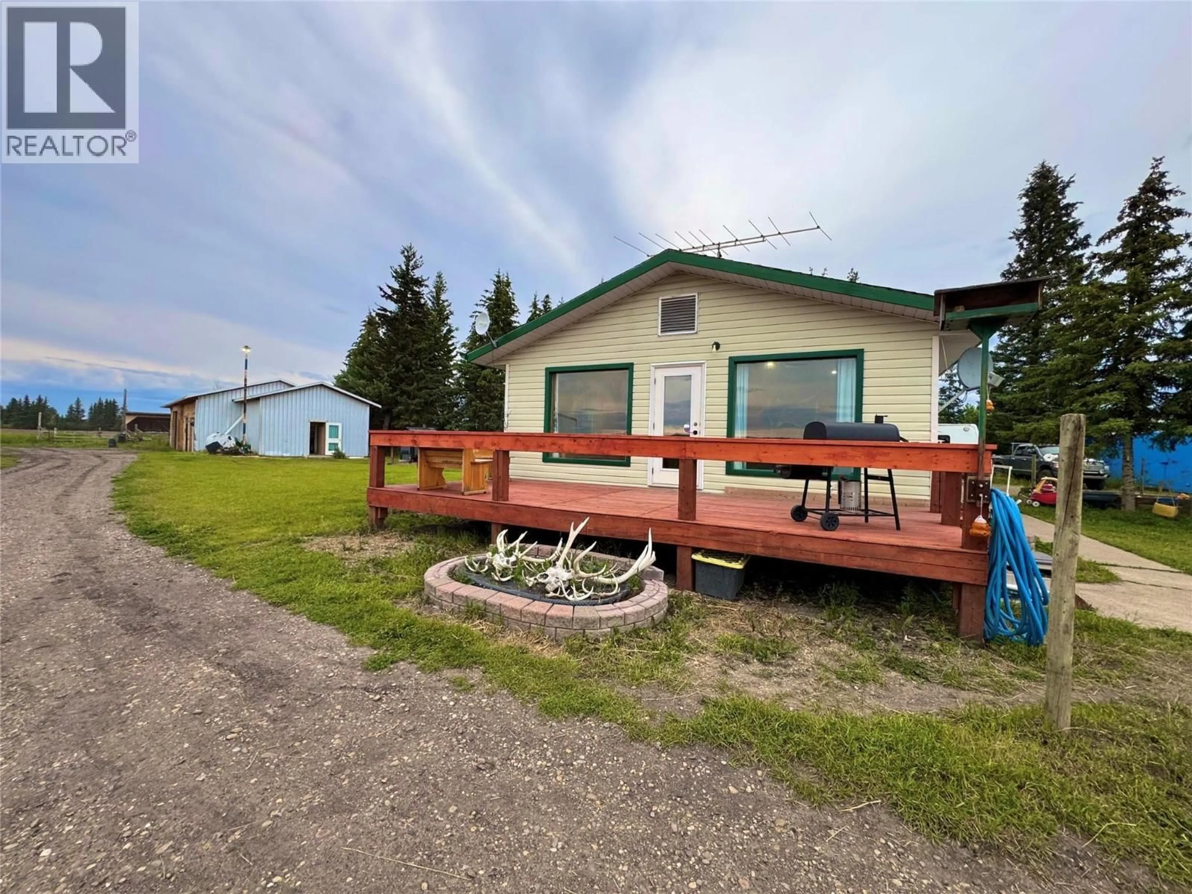 A pic from outside/outdoor area/front of a property/back of a property/a pic from drone, building for 15451 OLD EDMONTON HWY HIGHWAY, Dawson Creek British Columbia V0C2L0