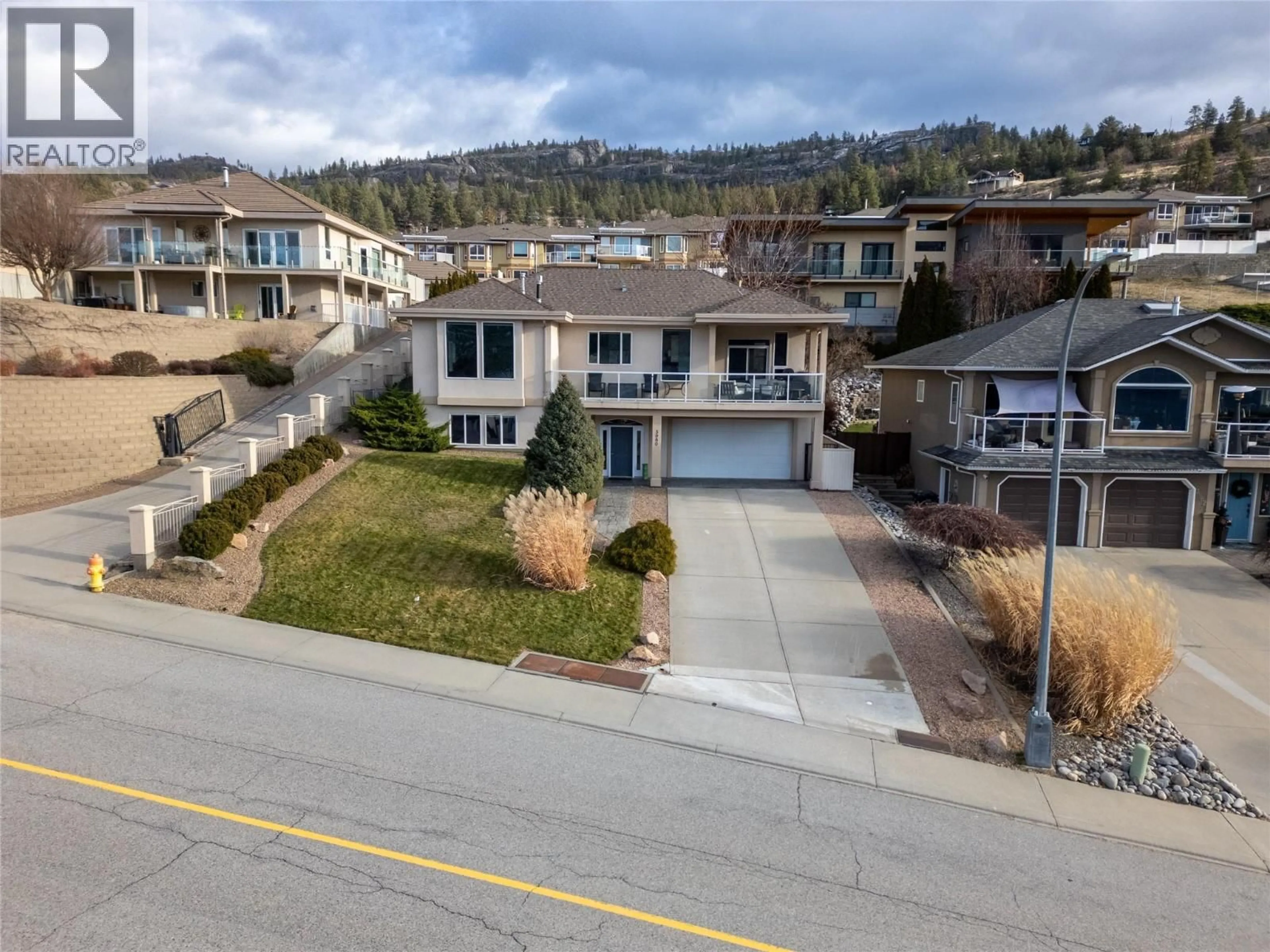 A pic from outside/outdoor area/front of a property/back of a property/a pic from drone, street for 3980 FINNERTY ROAD, Penticton British Columbia V2A8W2