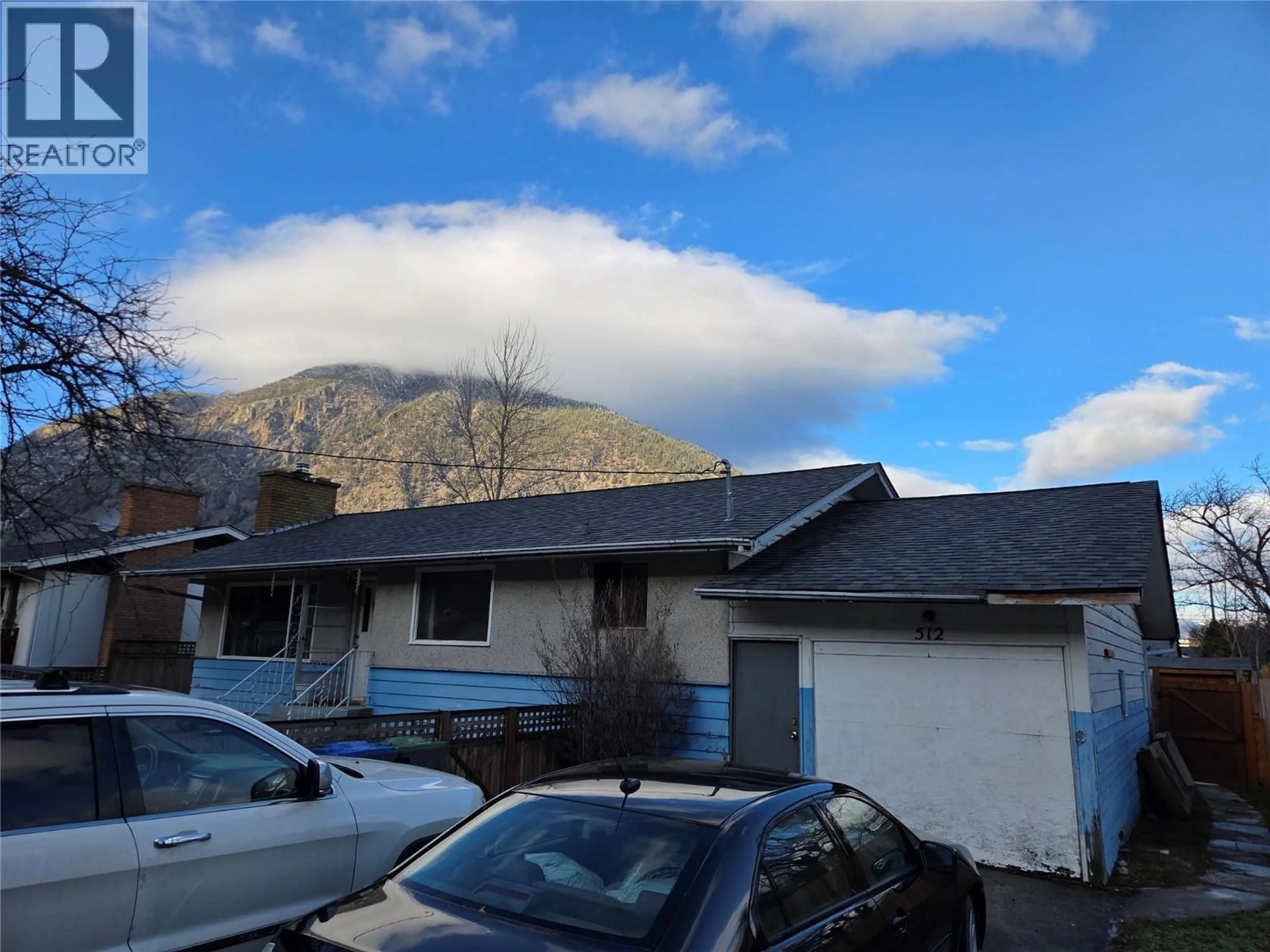 A pic from outside/outdoor area/front of a property/back of a property/a pic from drone, mountain view for 512 12TH AVENUE, Keremeos British Columbia V0X1N3