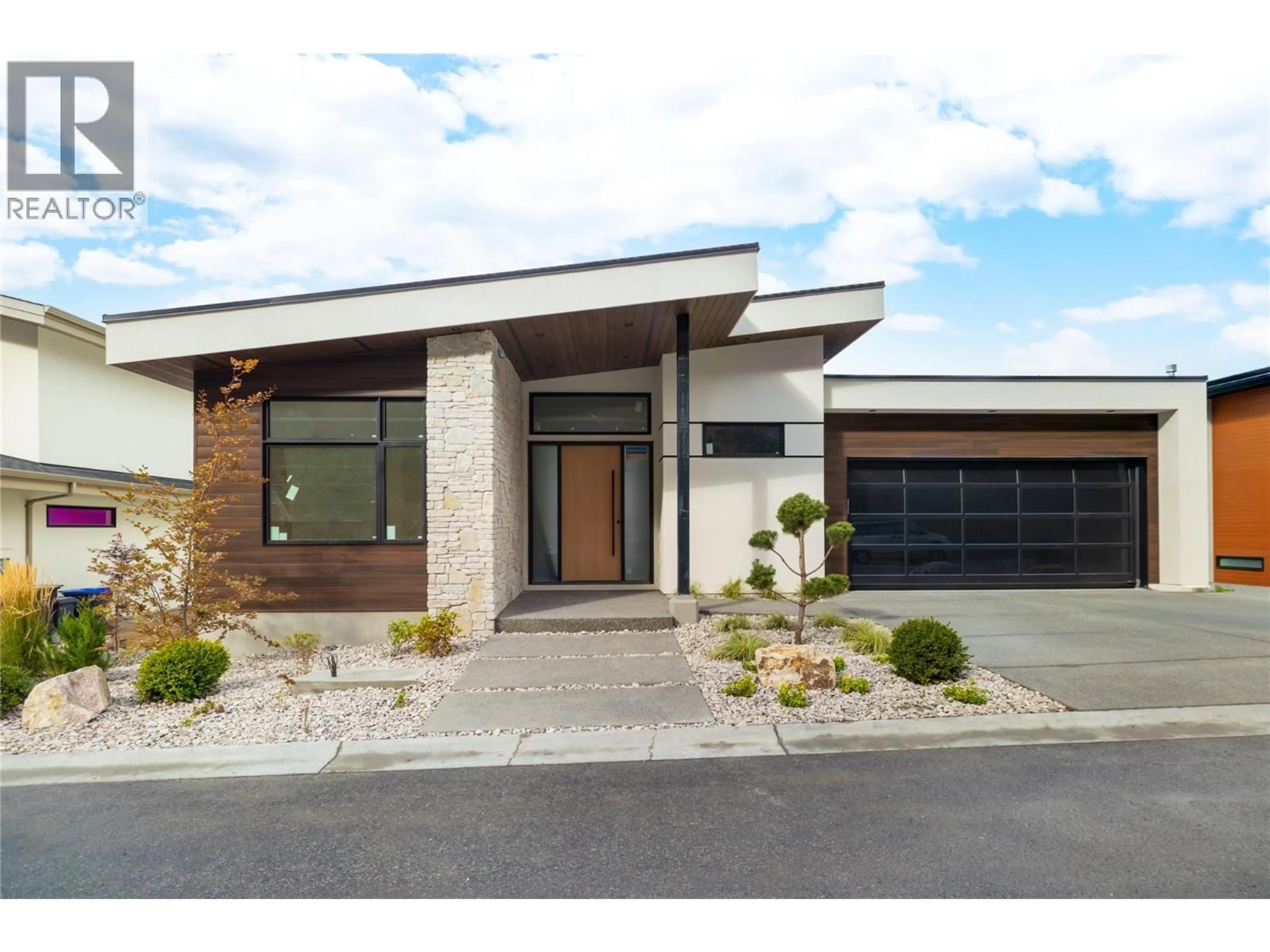 Home with brick exterior material, street for 573 CLIFTON COURT, Kelowna British Columbia V1V0B7