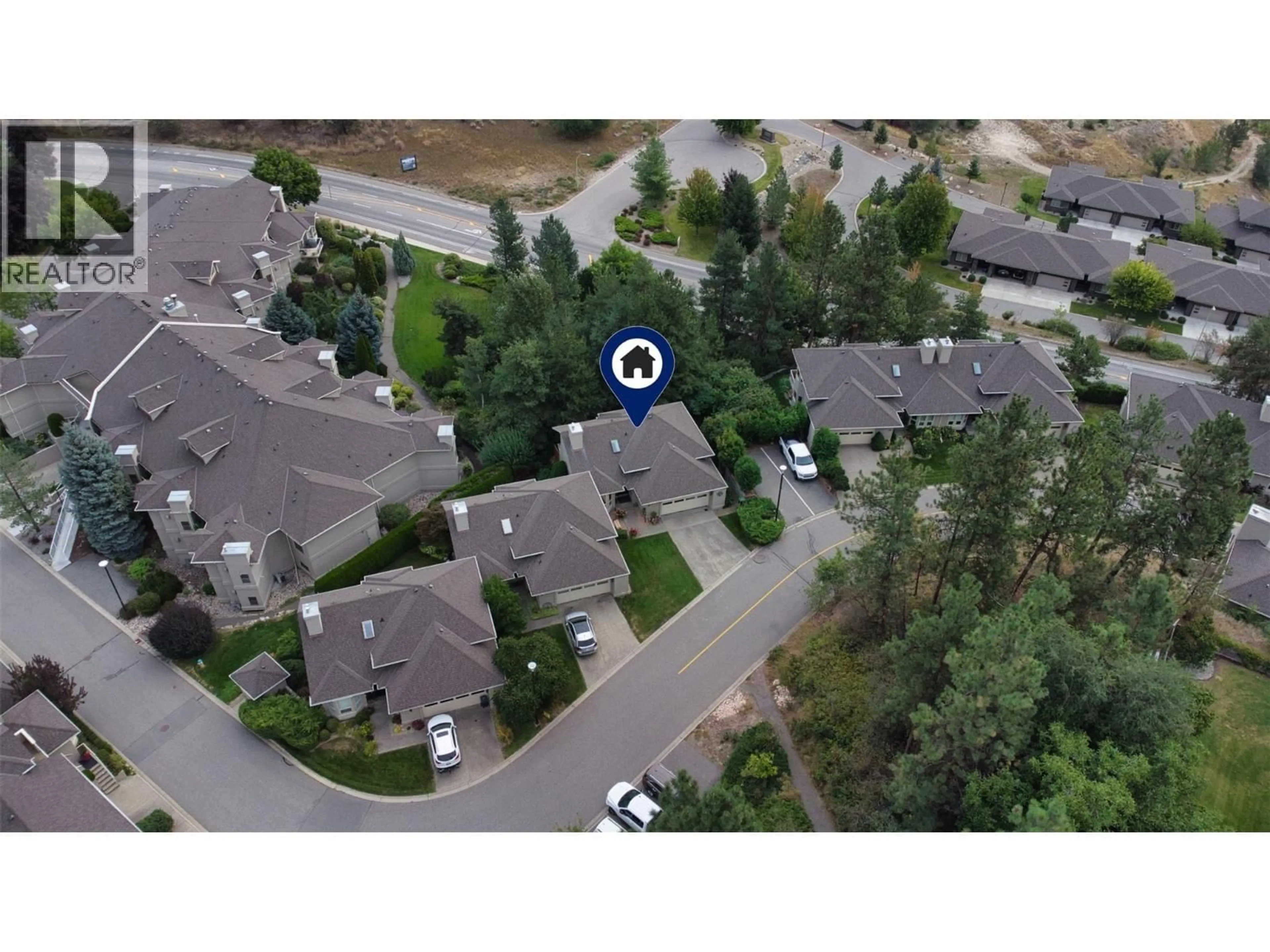 A pic from outside/outdoor area/front of a property/back of a property/a pic from drone, mountain view for 9 - 980 DILWORTH DRIVE, Kelowna British Columbia V1V1S6