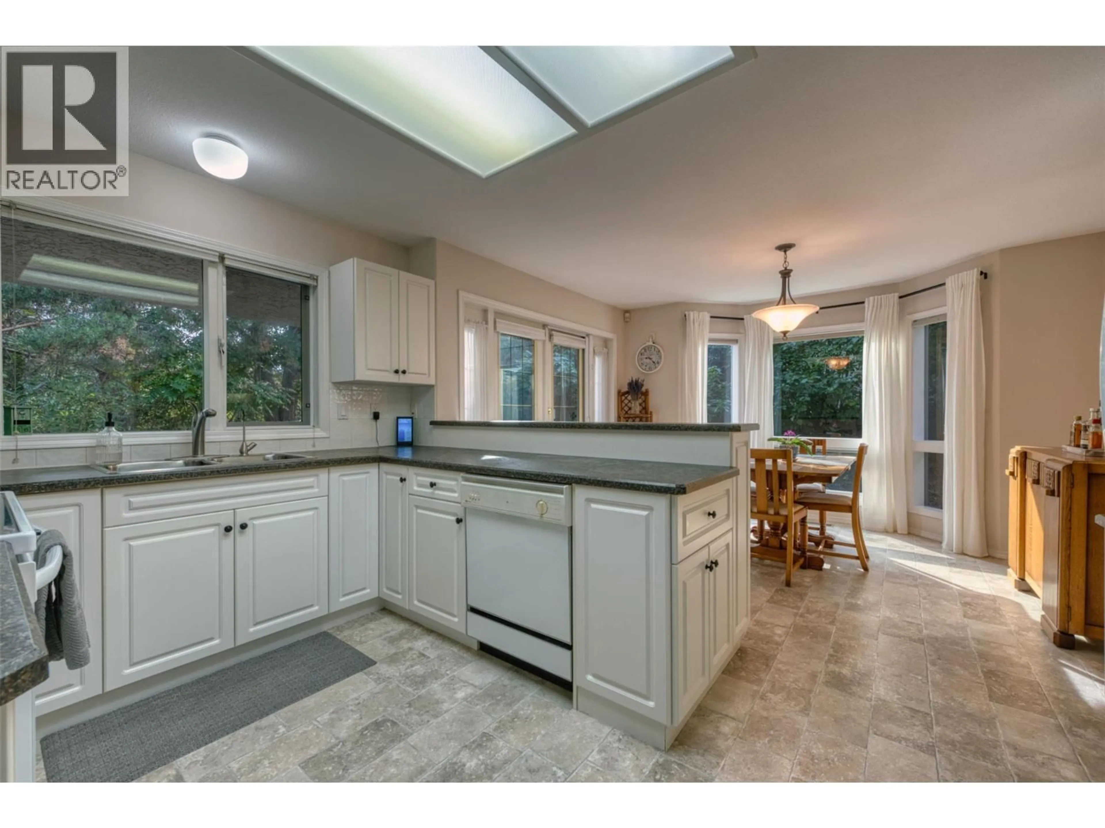 Open concept kitchen, ceramic/tile floor for 9 - 980 DILWORTH DRIVE, Kelowna British Columbia V1V1S6