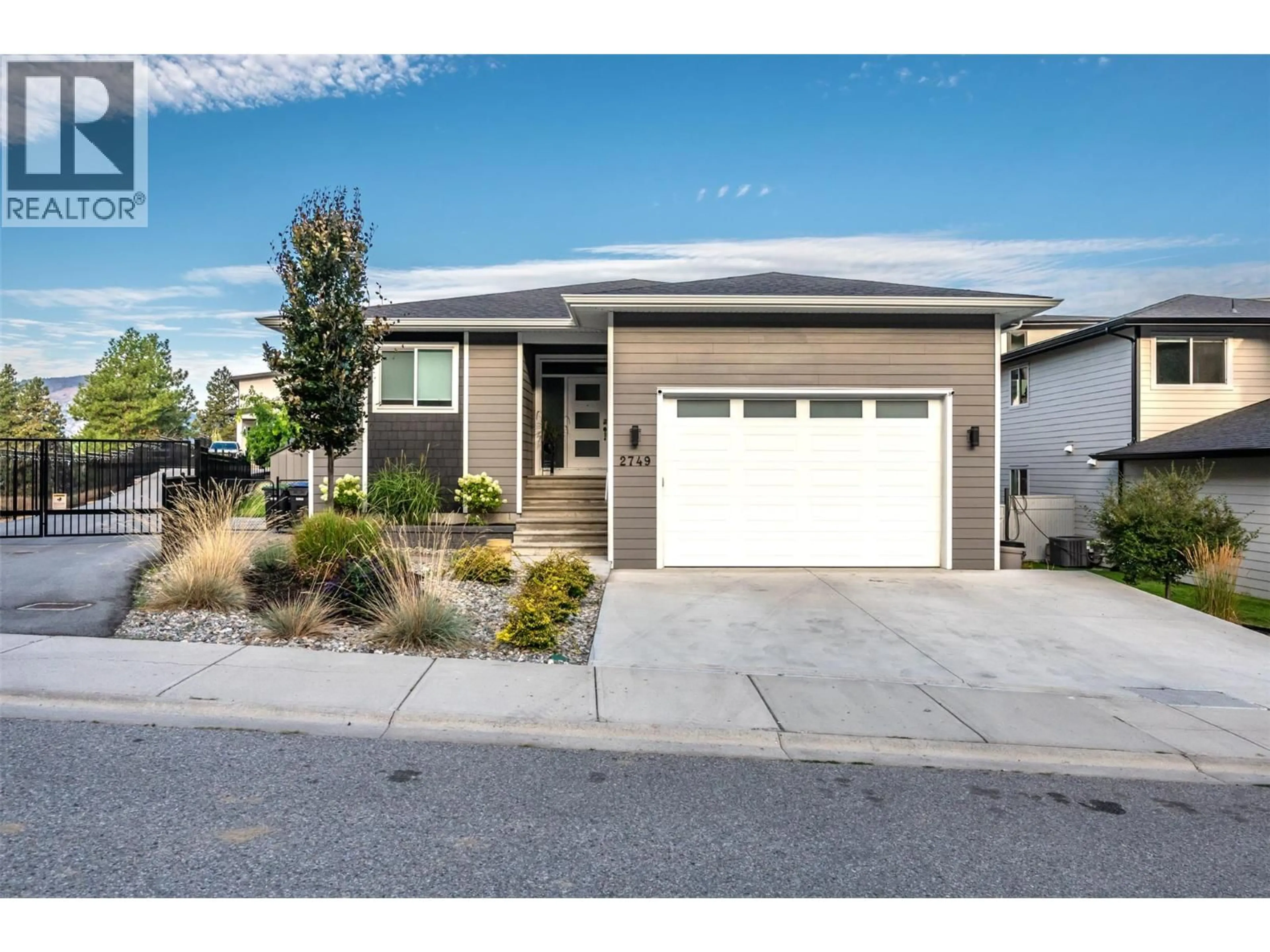 Home with vinyl exterior material, street for 2749 EVERGREEN DRIVE, Penticton British Columbia V2A2T1