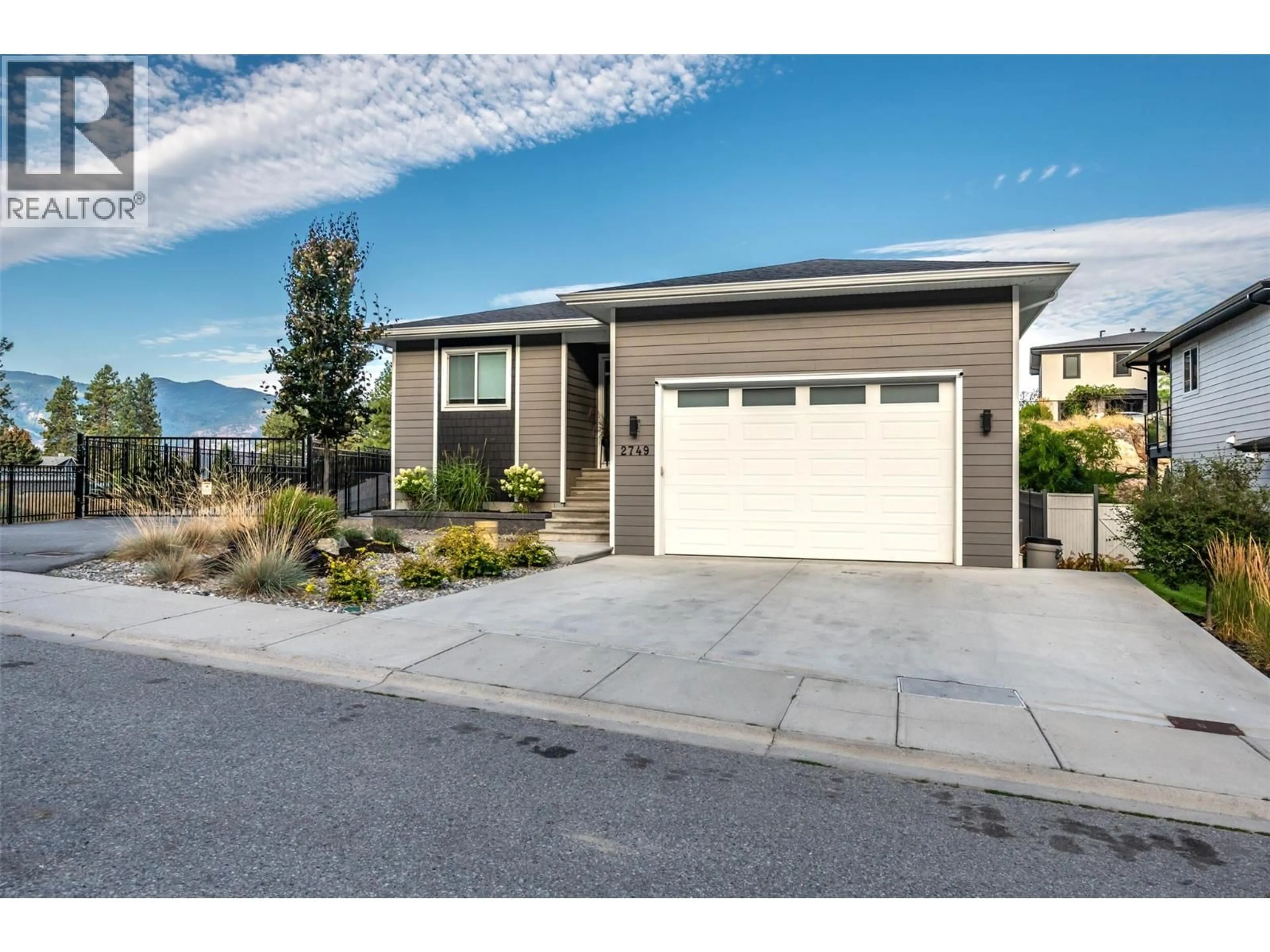 Home with vinyl exterior material, street for 2749 EVERGREEN DRIVE, Penticton British Columbia V2A2T1