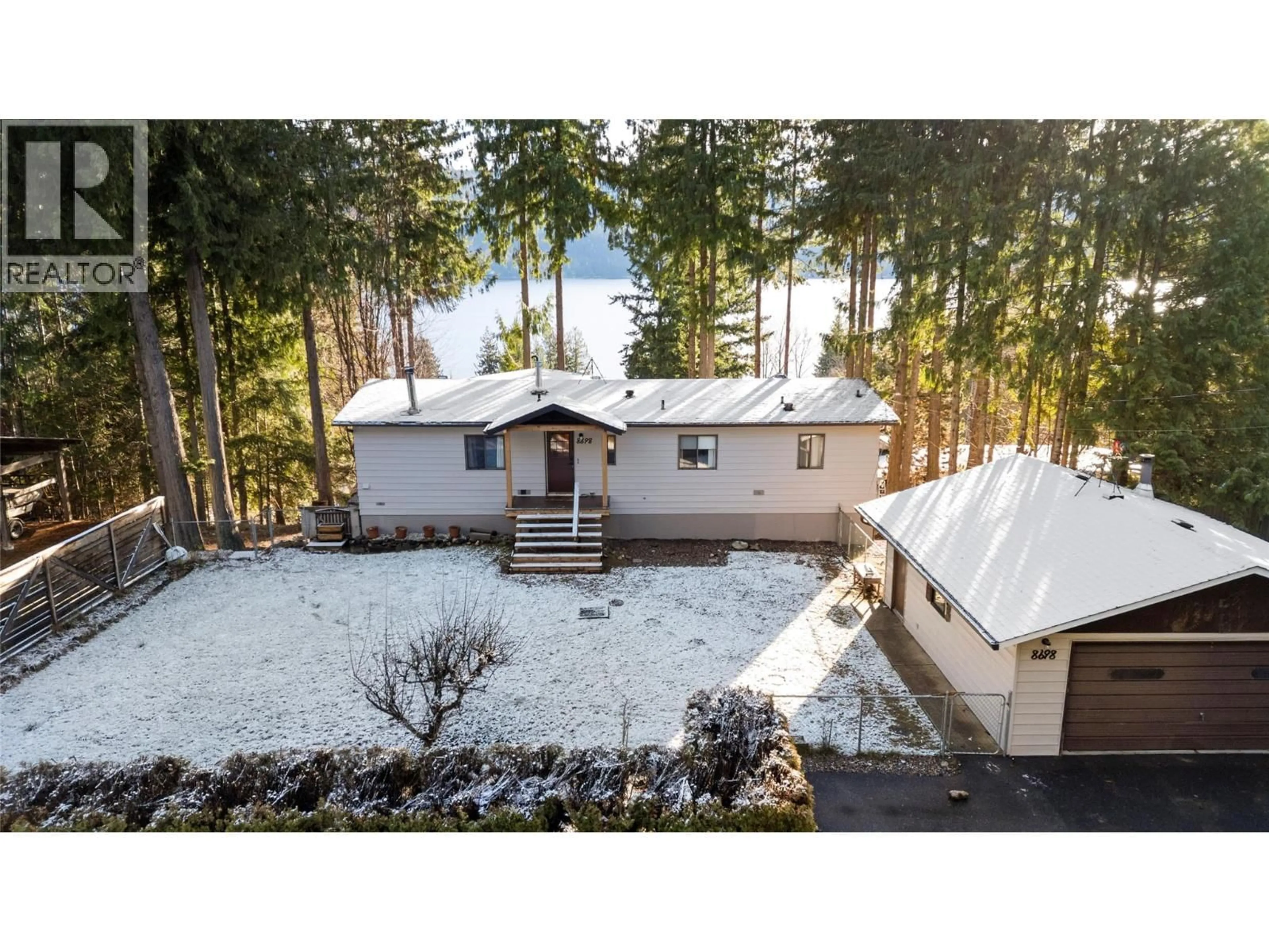 A pic from outside/outdoor area/front of a property/back of a property/a pic from drone, mountain view for 8698 PENWITH WAY, St. Ives British Columbia V0E1M9