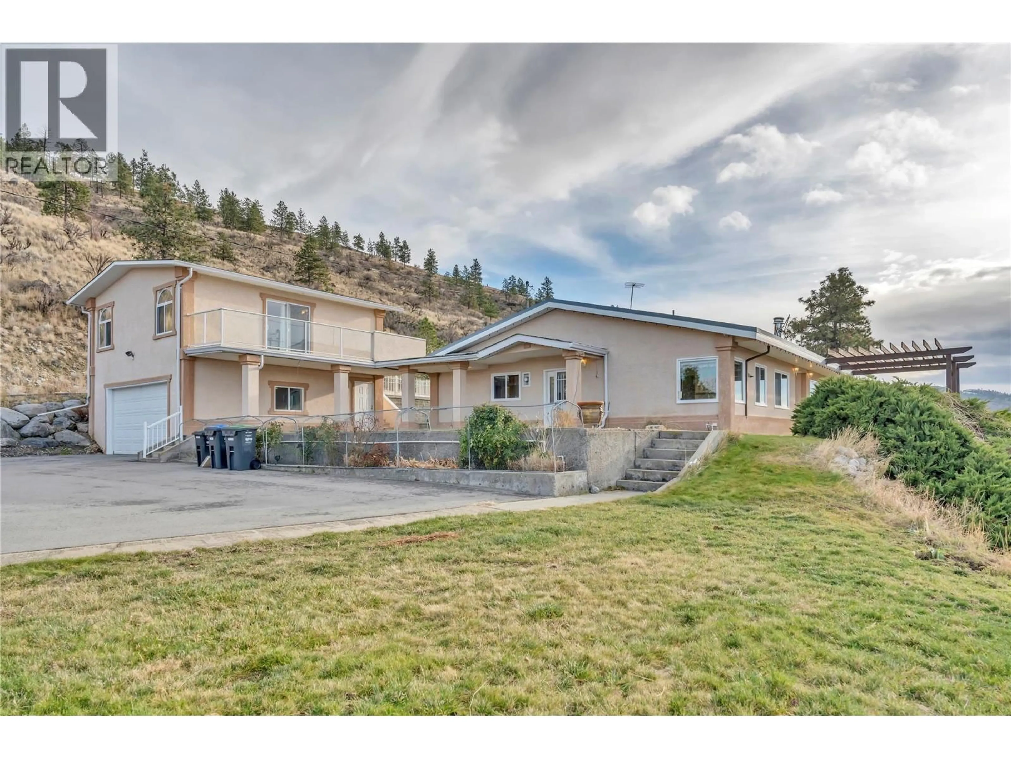 A pic from outside/outdoor area/front of a property/back of a property/a pic from drone, mountain view for 760 HUDSON STREET, Penticton British Columbia V2A8S9
