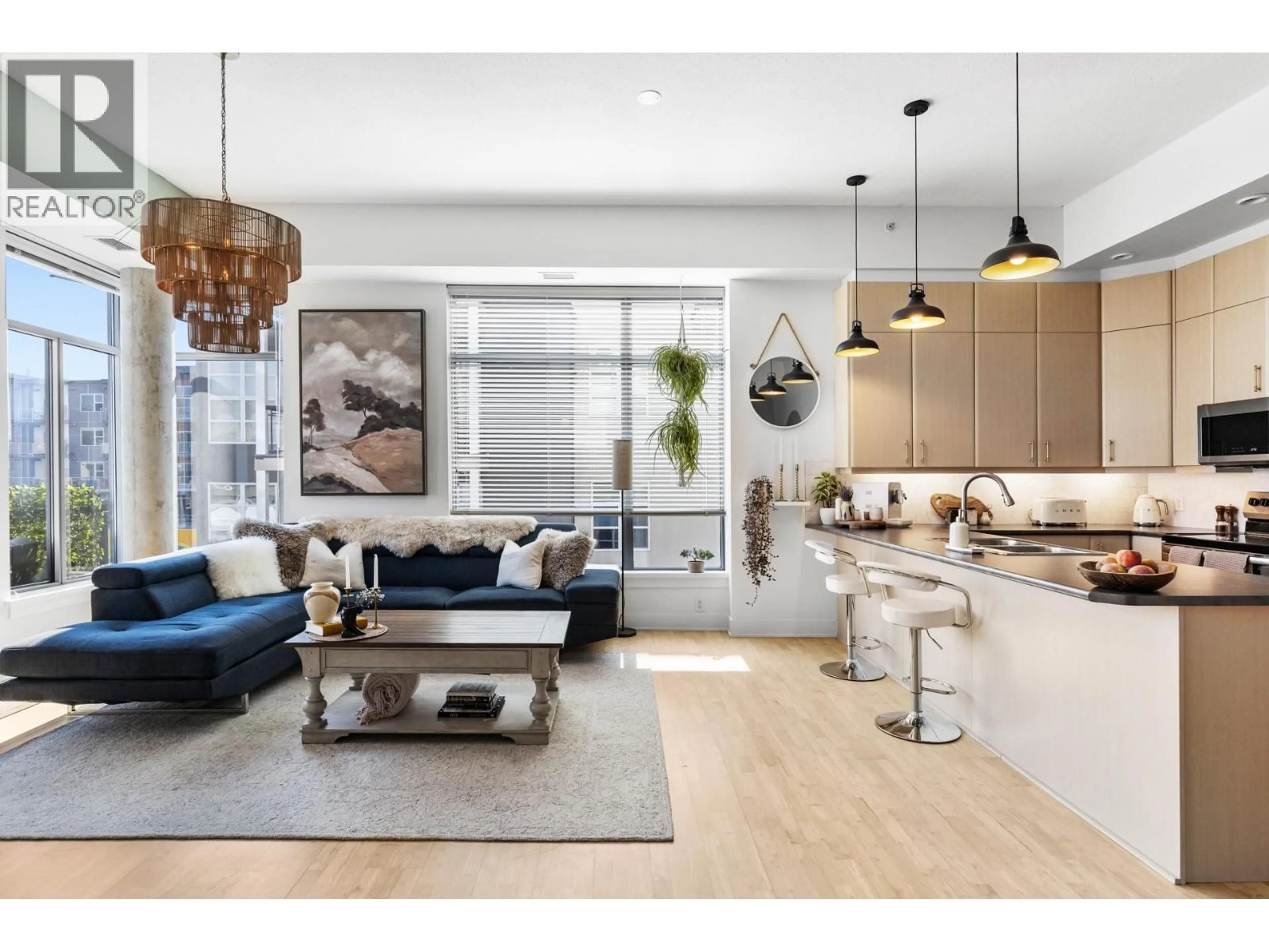 Open concept kitchen, wood/laminate floor for 304 - 1329 ELLIS STREET, Kelowna British Columbia V1Y9X5