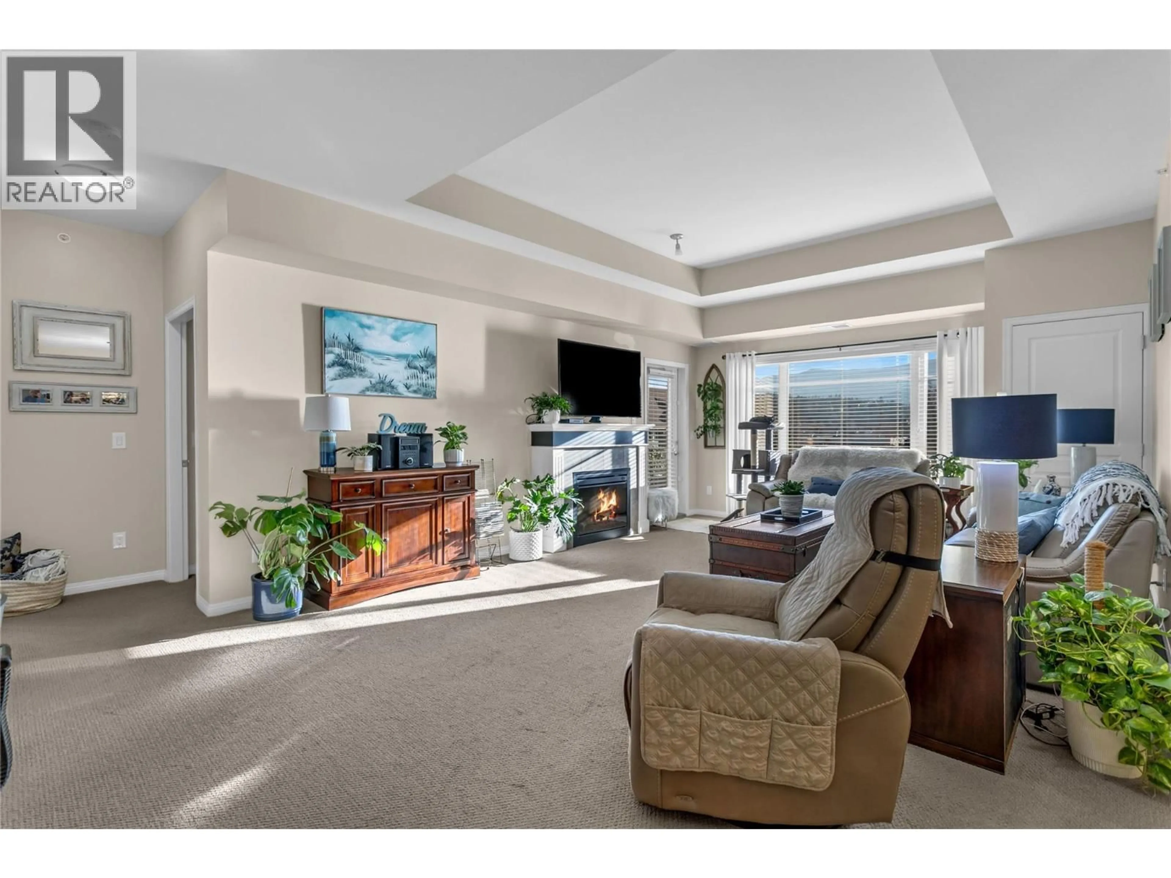Living room with furniture, unknown for 405 - 660 LEQUIME ROAD, Kelowna British Columbia V1W1A4