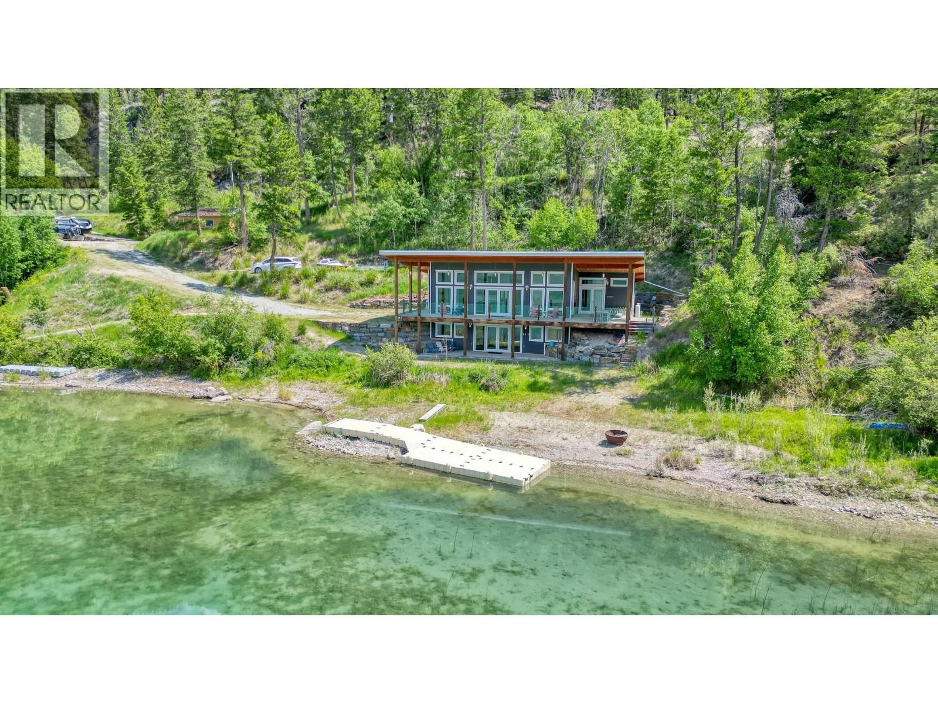 A pic from outside/outdoor area/front of a property/back of a property/a pic from drone, water/lake/river/ocean view for 8257 GRAINGER ROAD, Canal Flats British Columbia V0B1B0