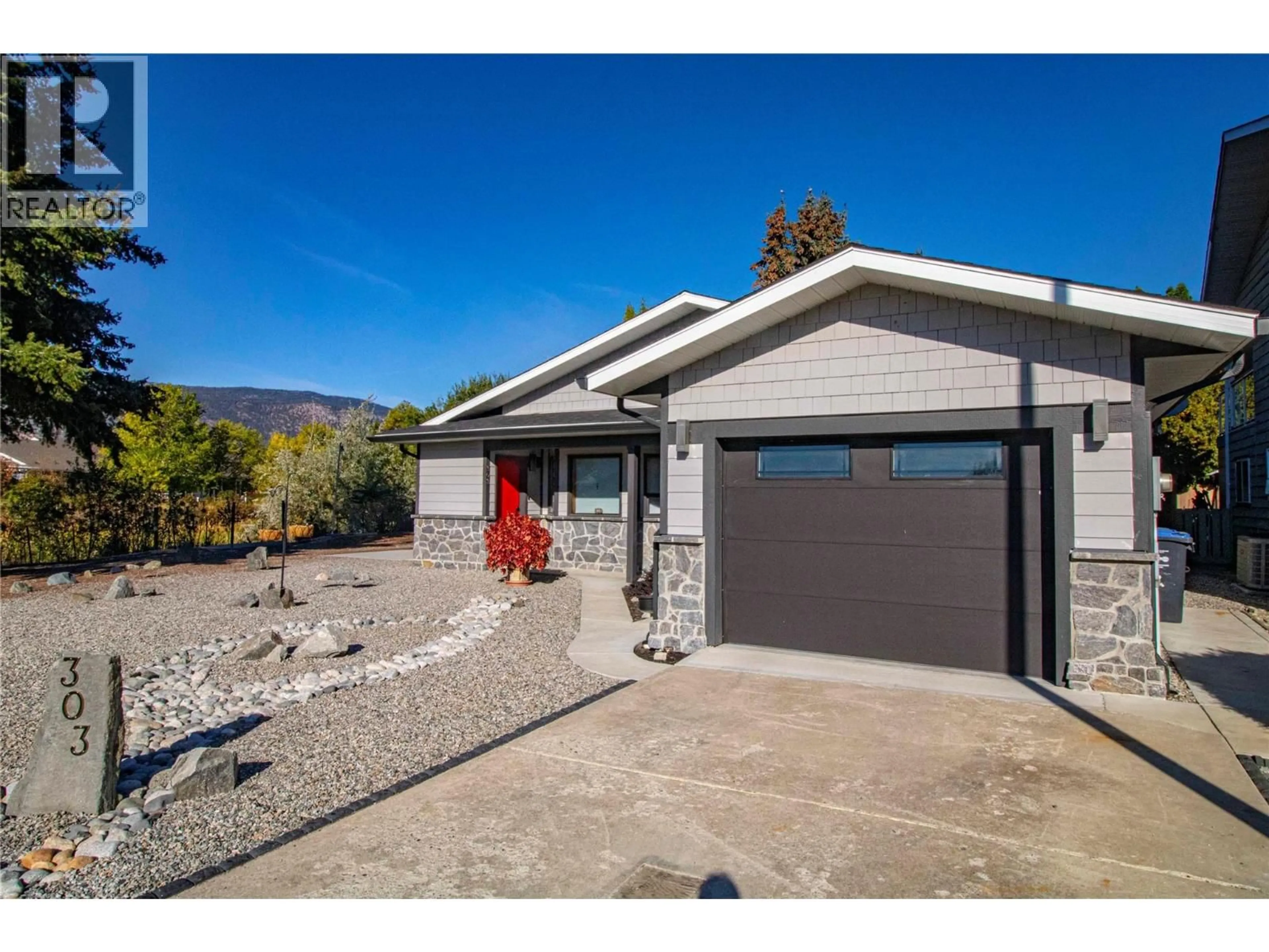 Home with vinyl exterior material, street for 303 ROY AVENUE, Penticton British Columbia V2A7M8