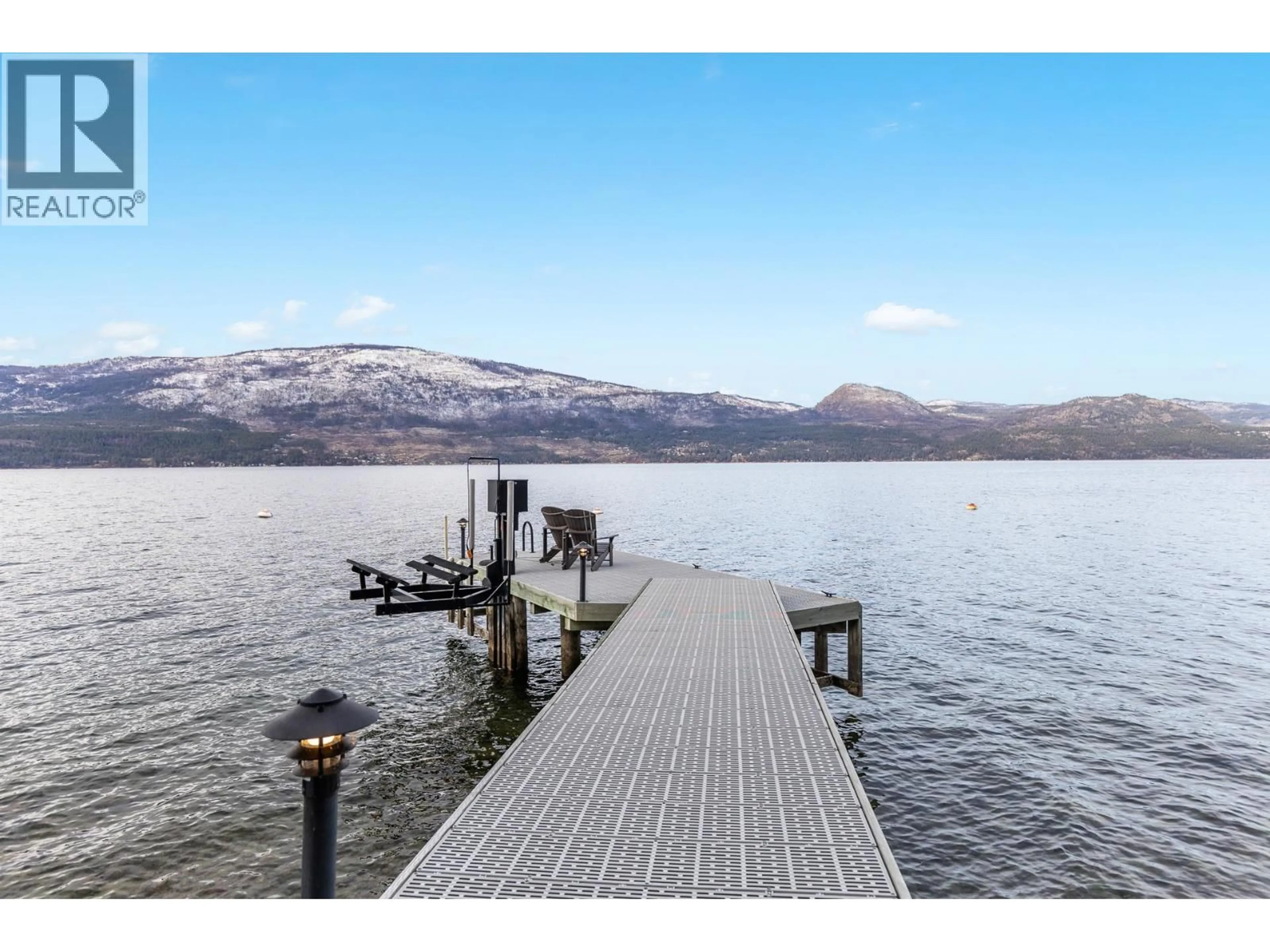 A pic from outside/outdoor area/front of a property/back of a property/a pic from drone, water/lake/river/ocean view for 3 - 9900 EASTSIDE ROAD, Vernon British Columbia V1H1L6