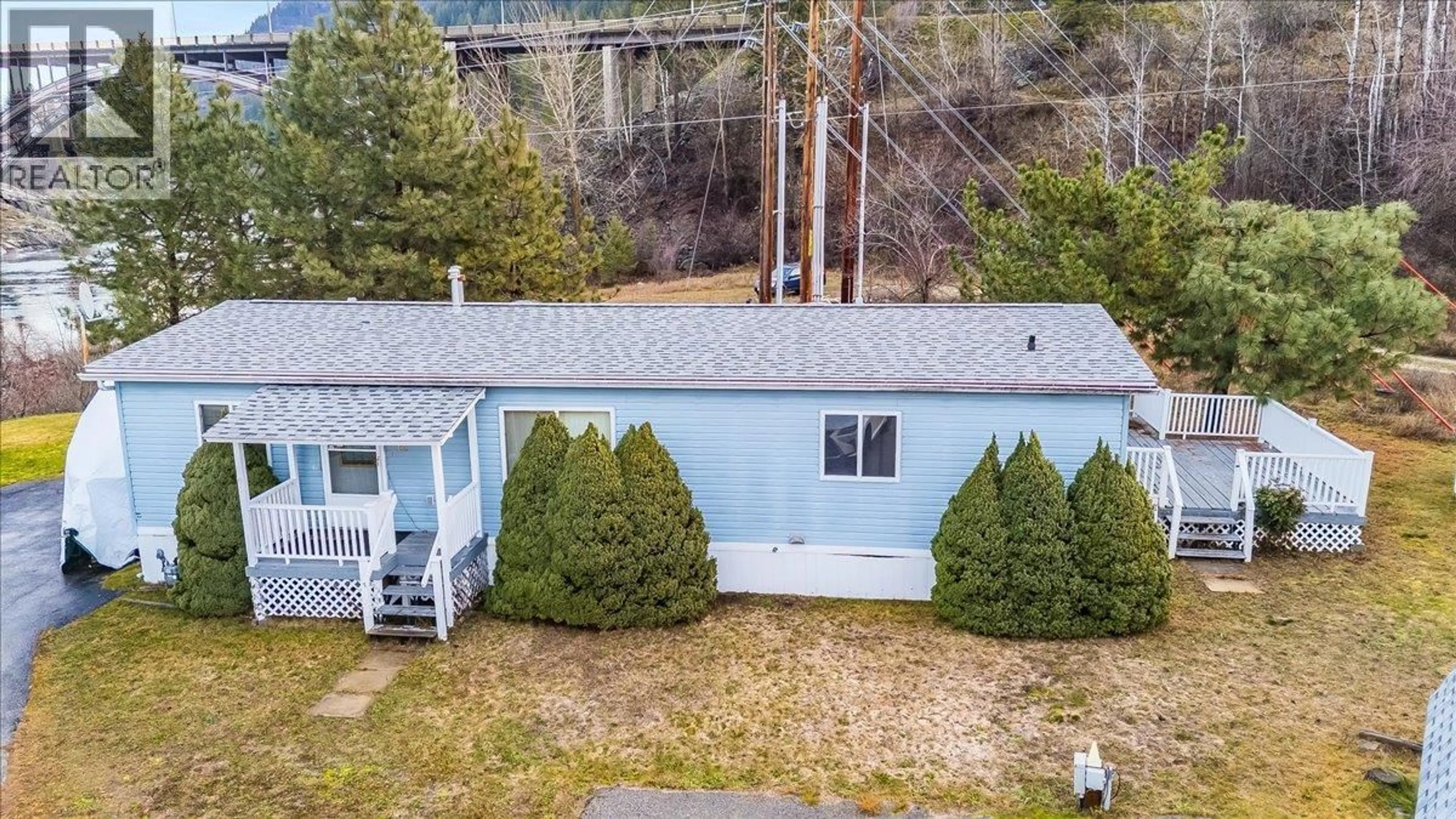 A pic from outside/outdoor area/front of a property/back of a property/a pic from drone, unknown for 13 - 651 ROSEDALE ROAD, Castlegar British Columbia V1N3H7