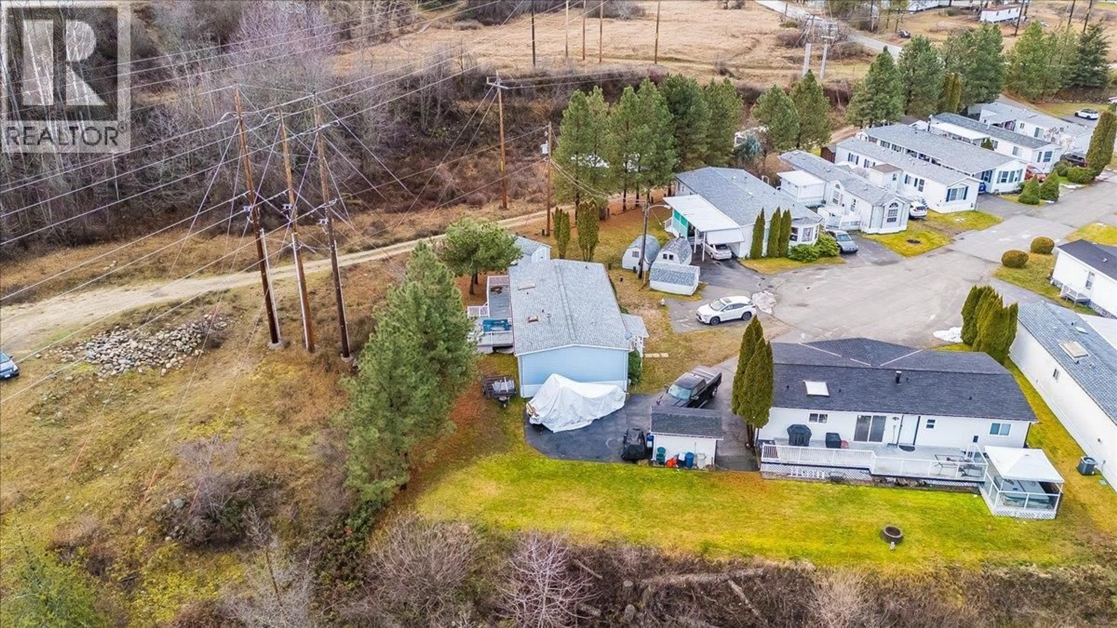 A pic from outside/outdoor area/front of a property/back of a property/a pic from drone, unknown for 13 - 651 ROSEDALE ROAD, Castlegar British Columbia V1N3H7