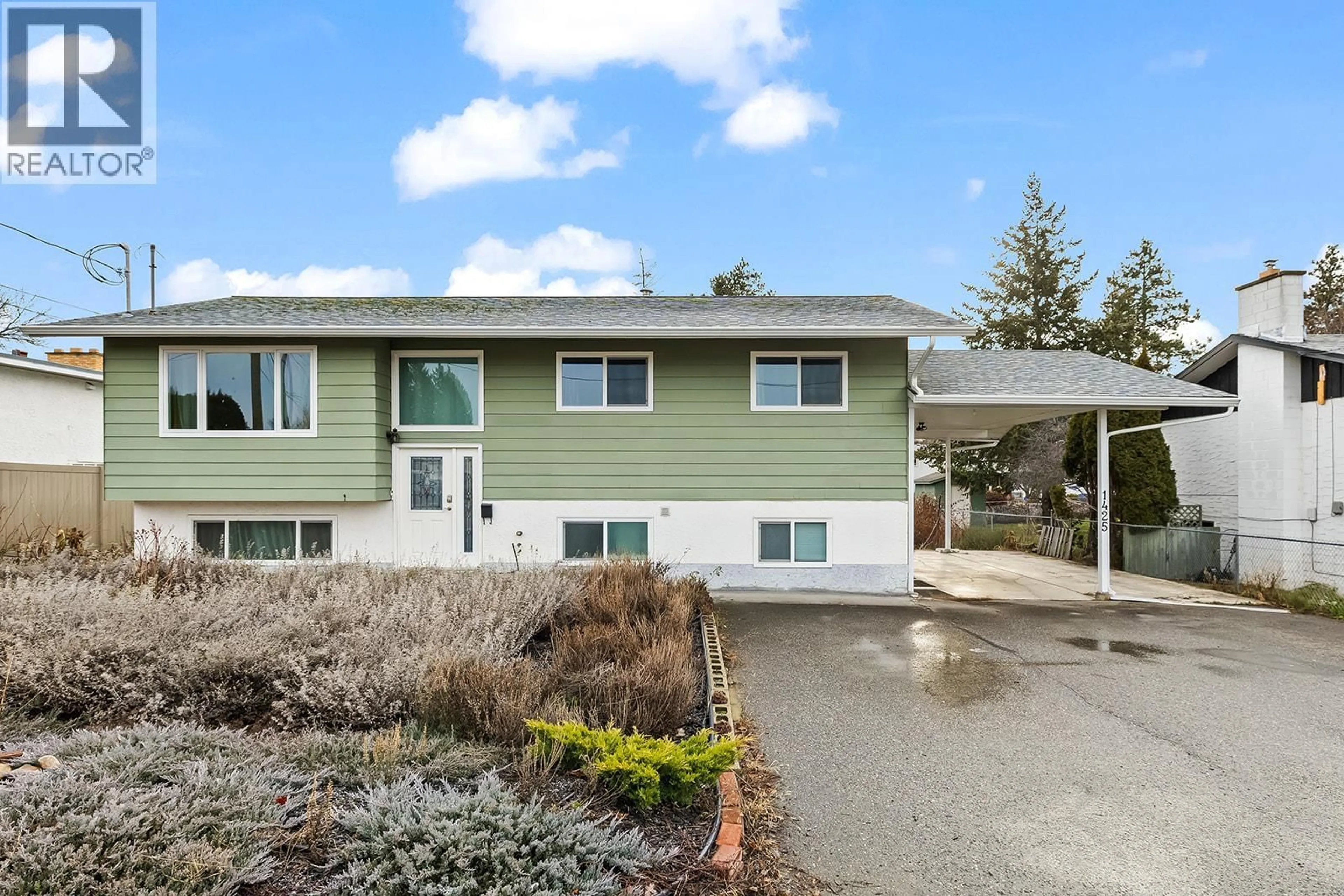 Home with vinyl exterior material, street for 1425 COLLISON ROAD, Kelowna British Columbia V1X1K9