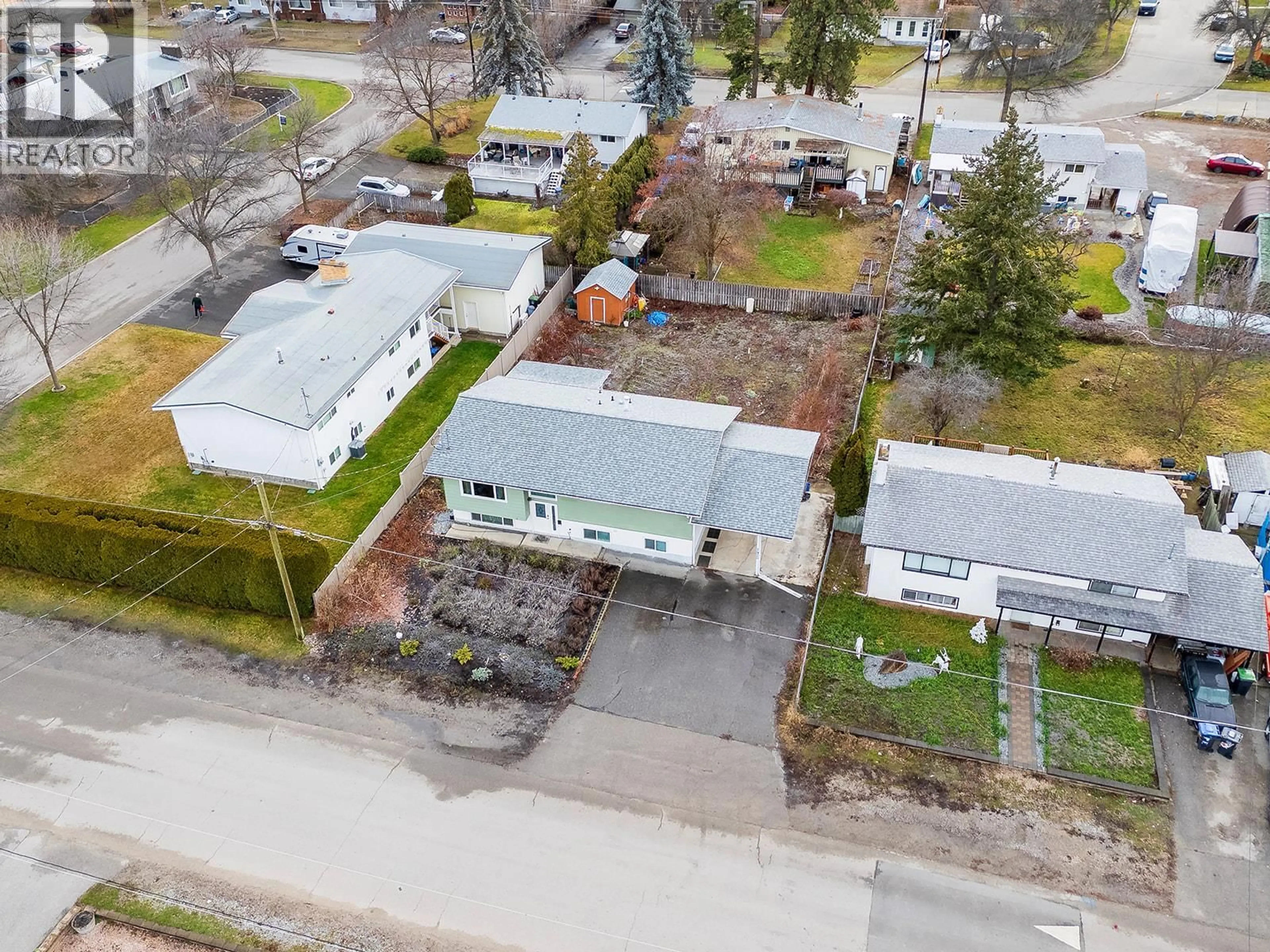 A pic from outside/outdoor area/front of a property/back of a property/a pic from drone, street for 1425 COLLISON ROAD, Kelowna British Columbia V1X1K9