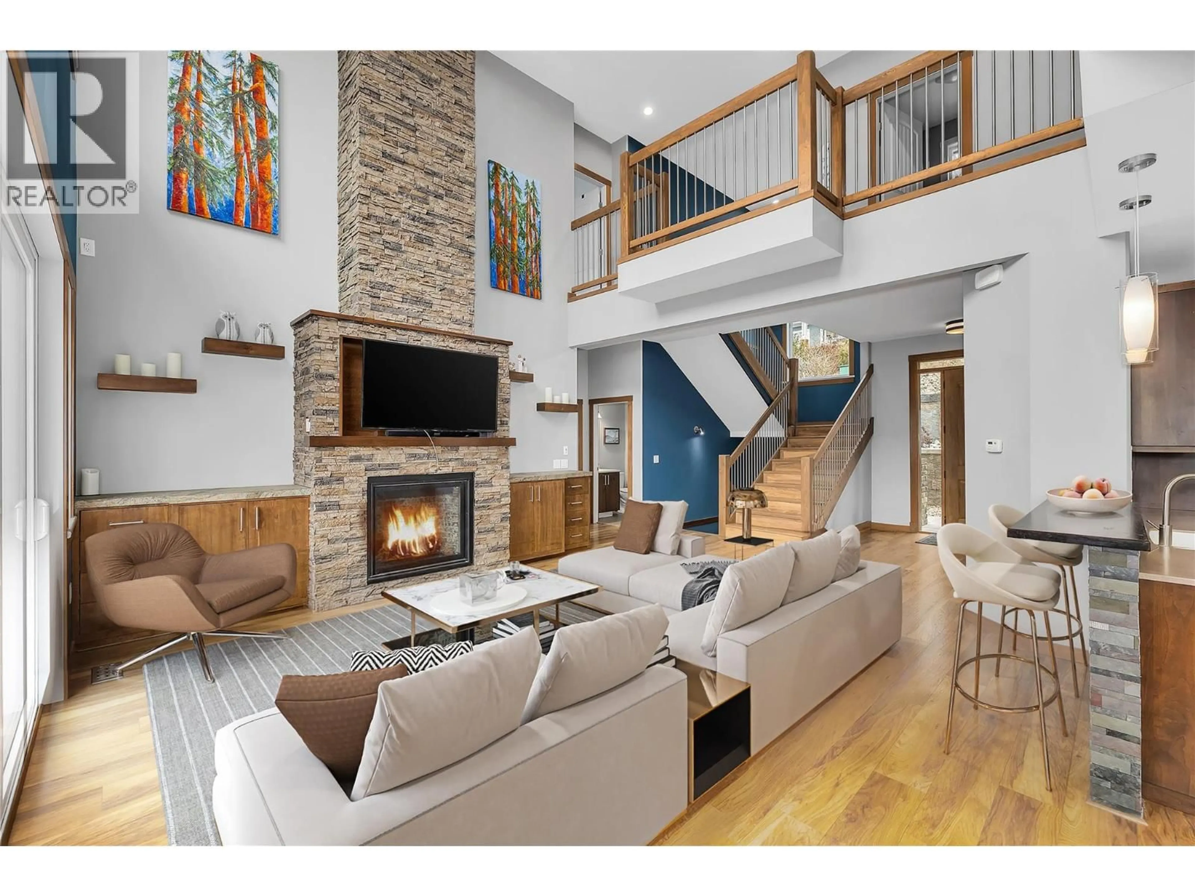 Living room with furniture, wood/laminate floor for 13598 TOWNSEND DRIVE, Lake Country British Columbia V4V2S8