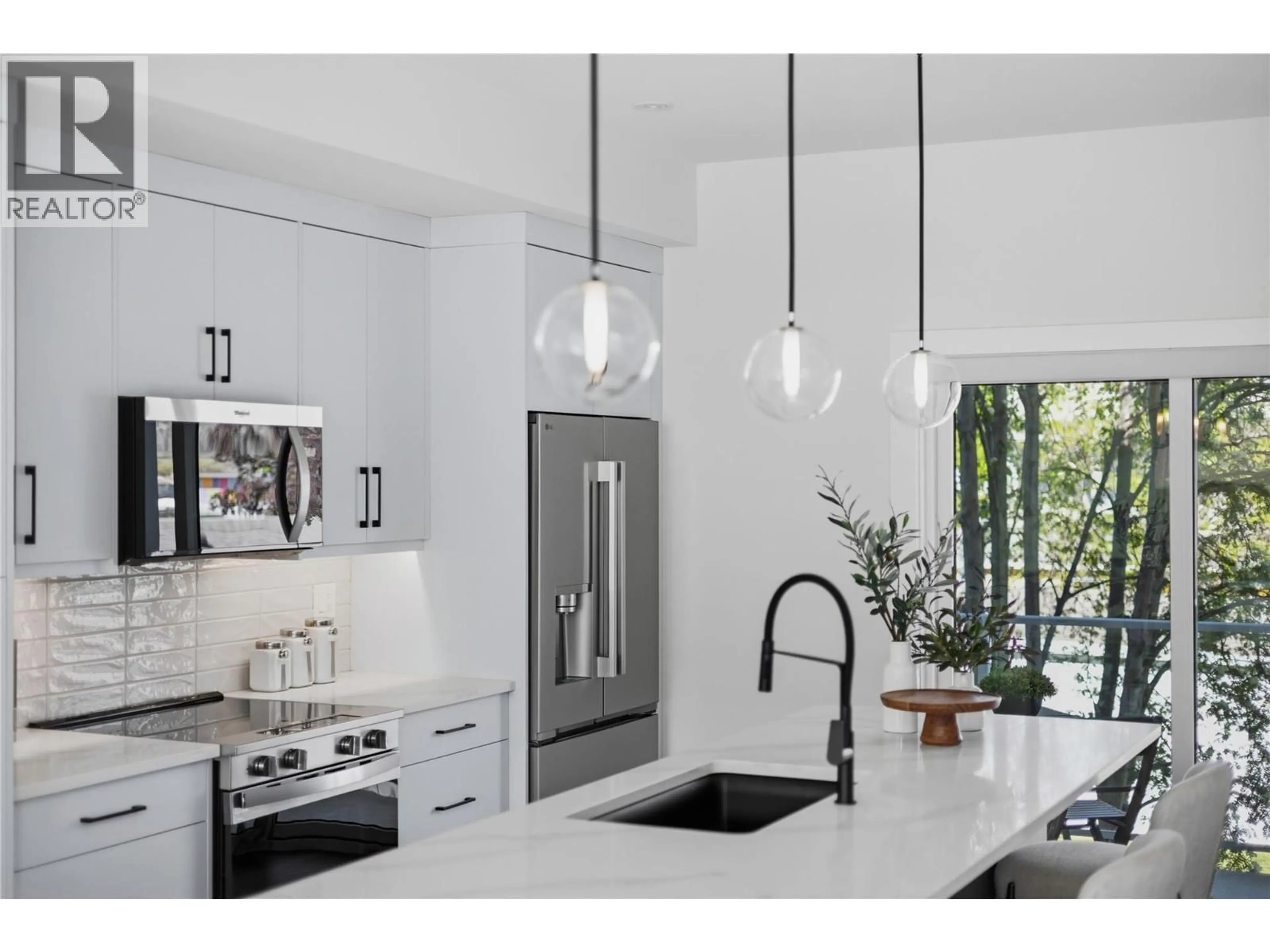 Contemporary kitchen, ceramic/tile floor for 101 - 143 GREEN AVENUE, Penticton British Columbia V2A3S9