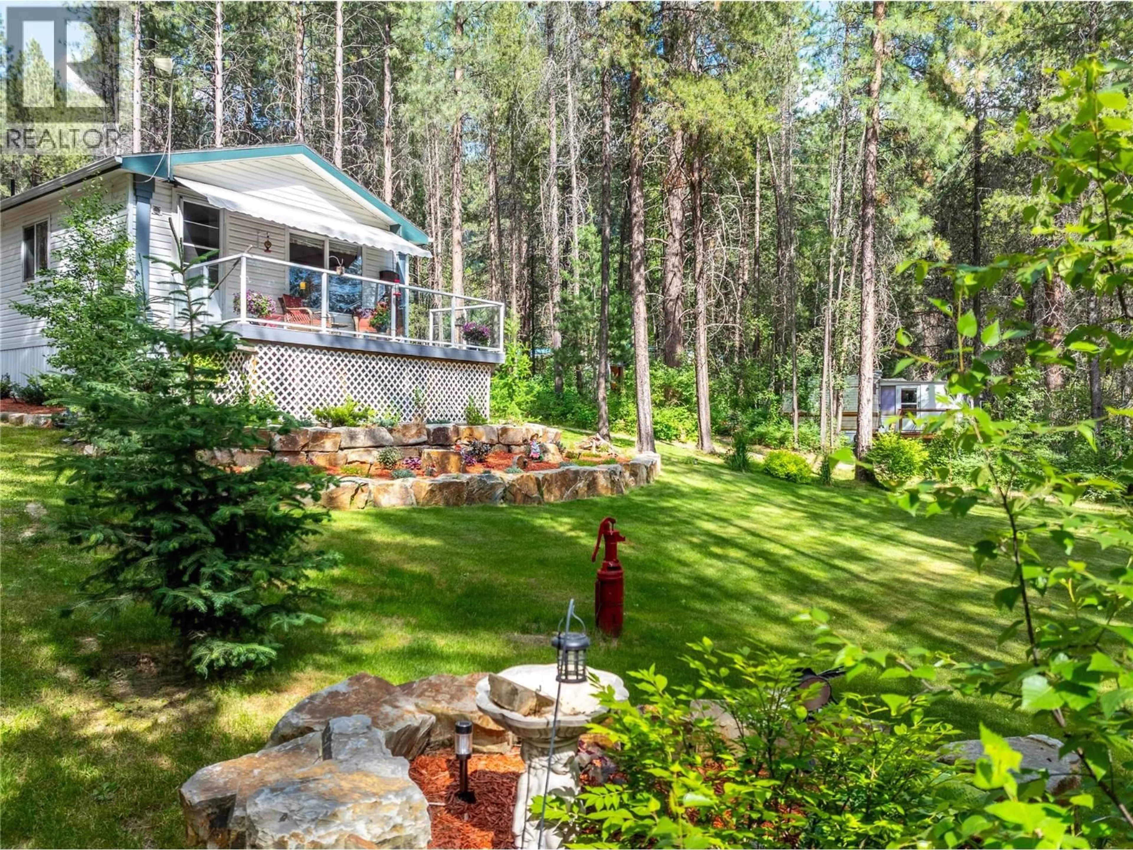 A pic from outside/outdoor area/front of a property/back of a property/a pic from drone, forest/trees view for 6996 95 HIGHWAY, Kingsgate British Columbia V0B1V1