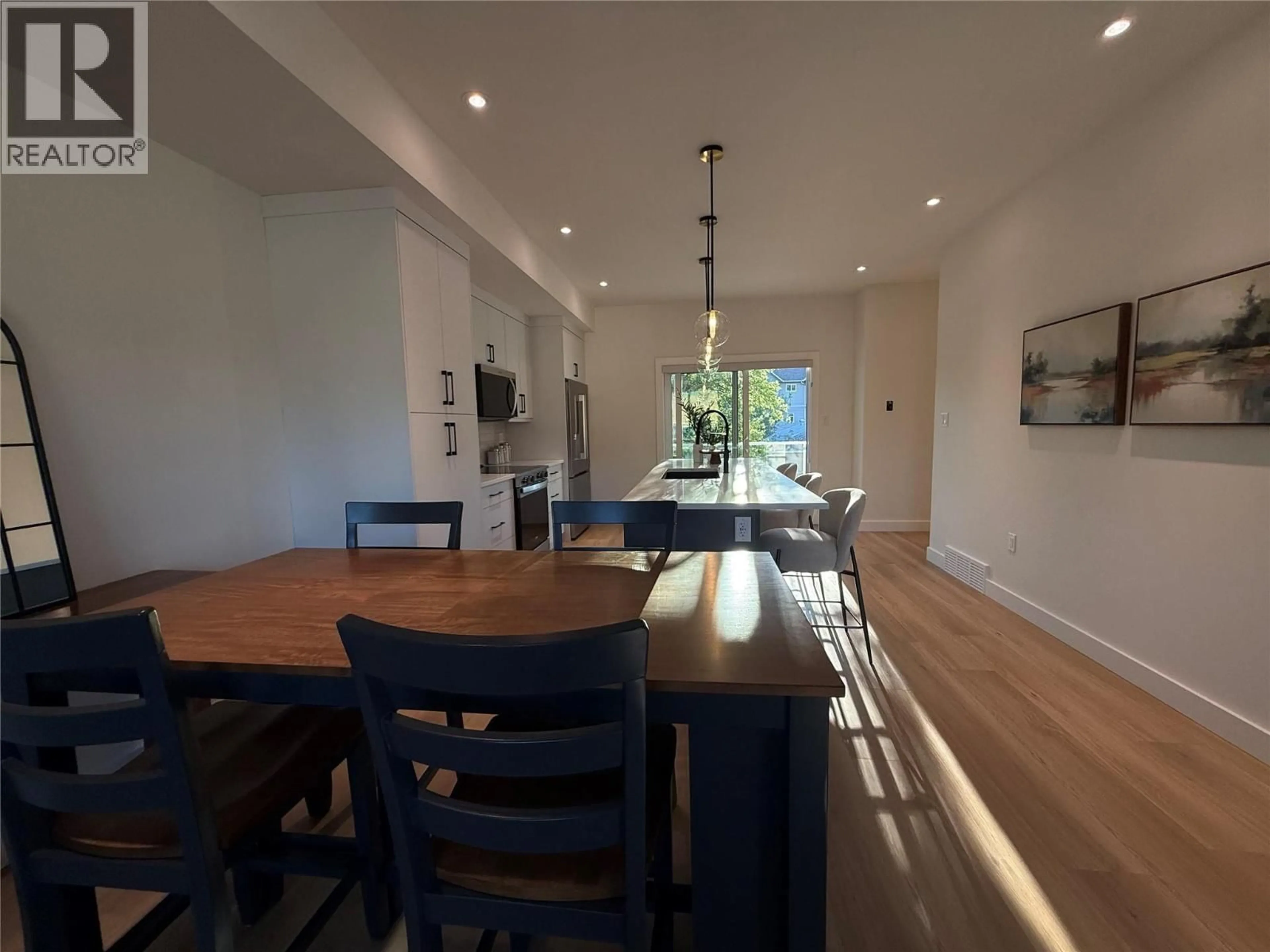 Dining room, wood/laminate floor for 104 - 143 GREEN AVENUE, Penticton British Columbia V2A3S9