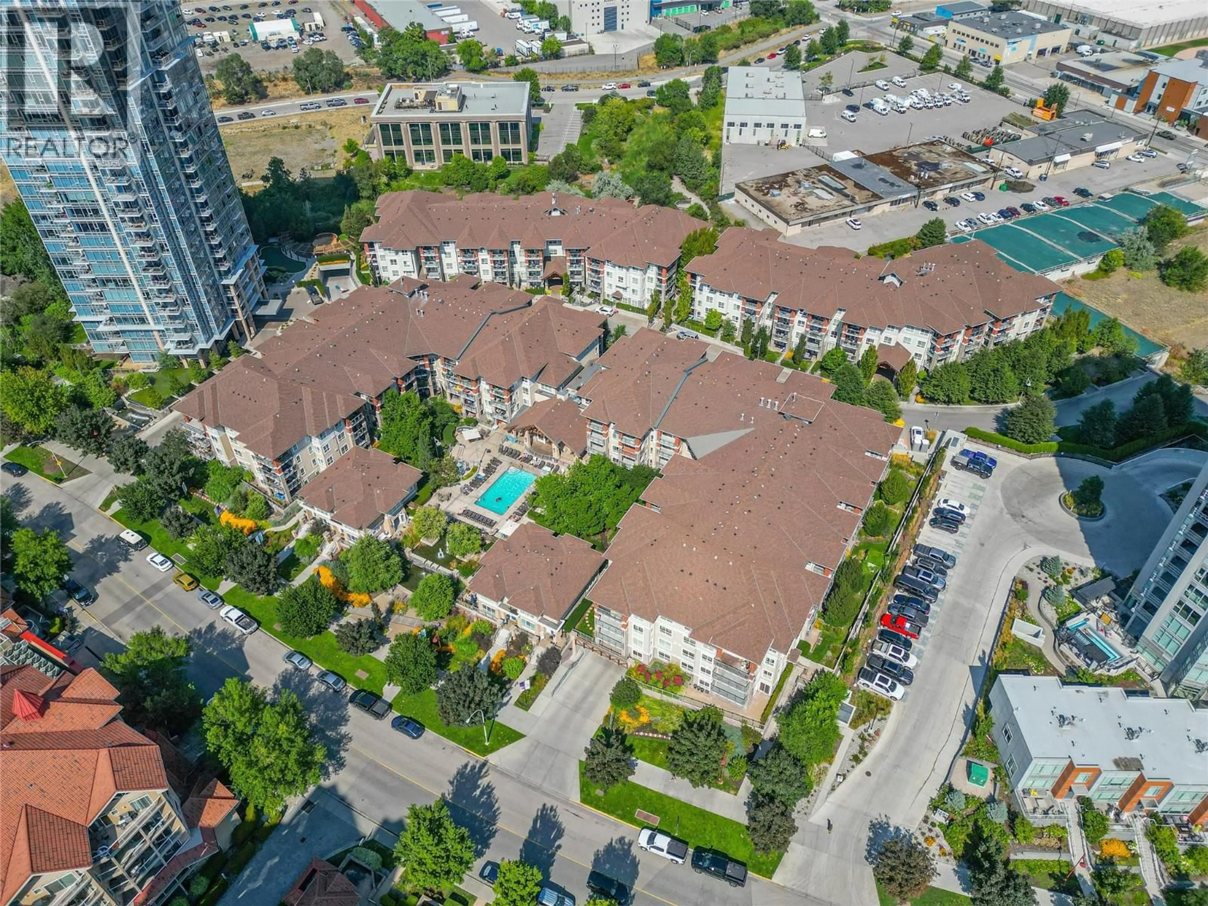 A pic from outside/outdoor area/front of a property/back of a property/a pic from drone, city buildings view from balcony for 105 - 1093 SUNSET DRIVE, Kelowna British Columbia V1Y9Z4