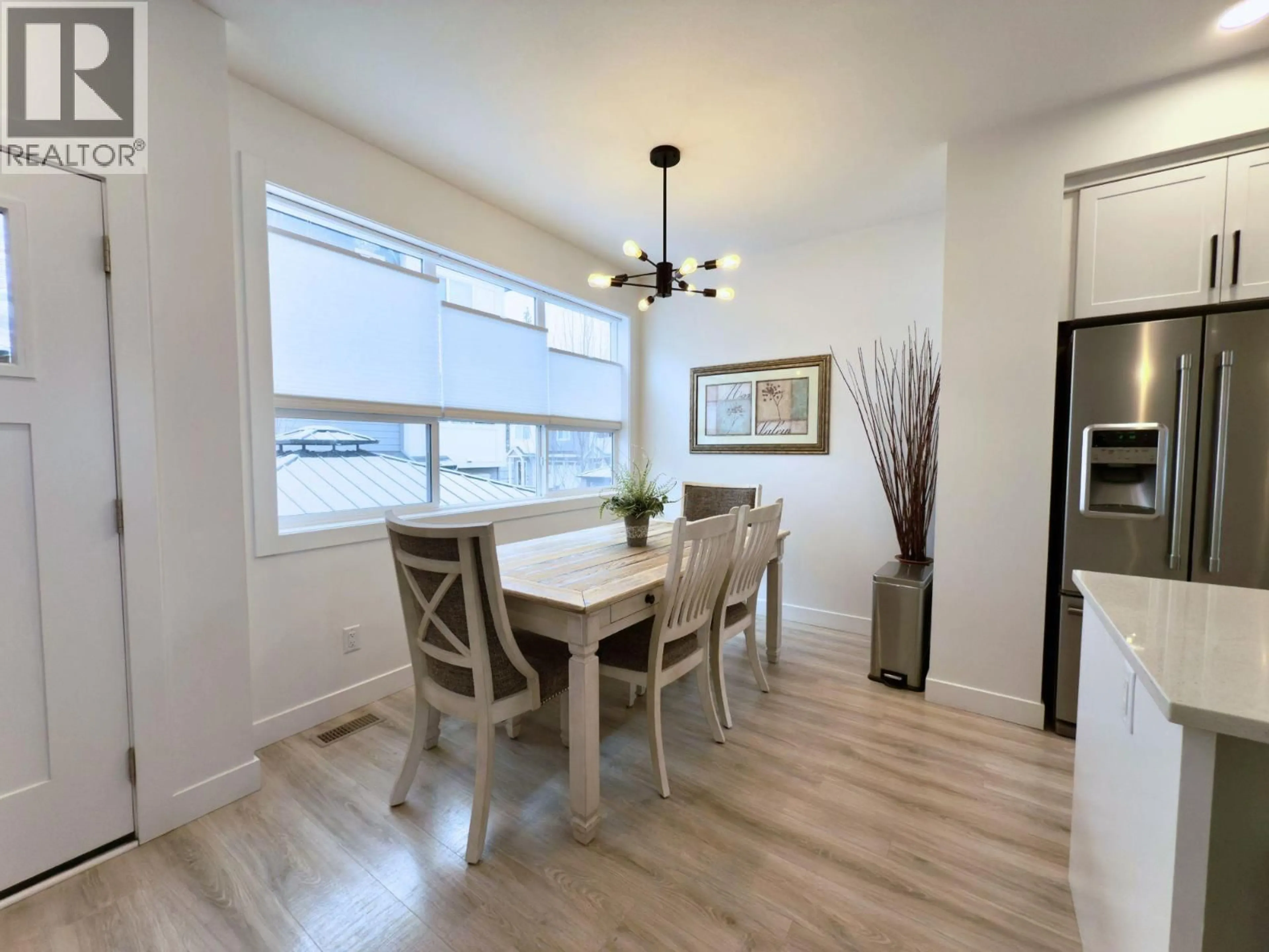 Dining room, wood/laminate floor for 28 - 12075 OCEOLA ROAD, Lake Country British Columbia V4V1H1