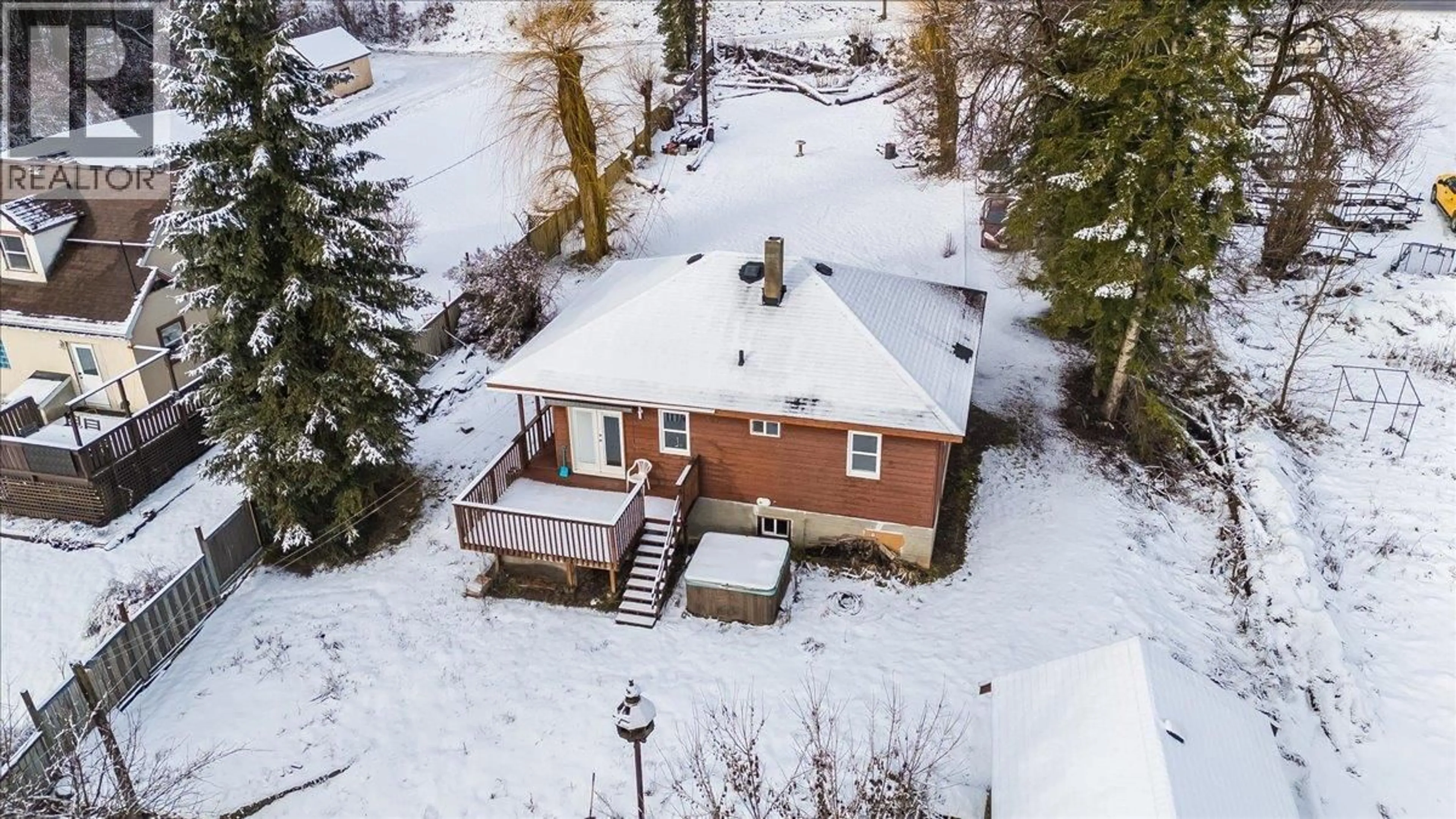 A pic from outside/outdoor area/front of a property/back of a property/a pic from drone, street for 1458 3B HIGHWAY, Fruitvale British Columbia V0G1L1