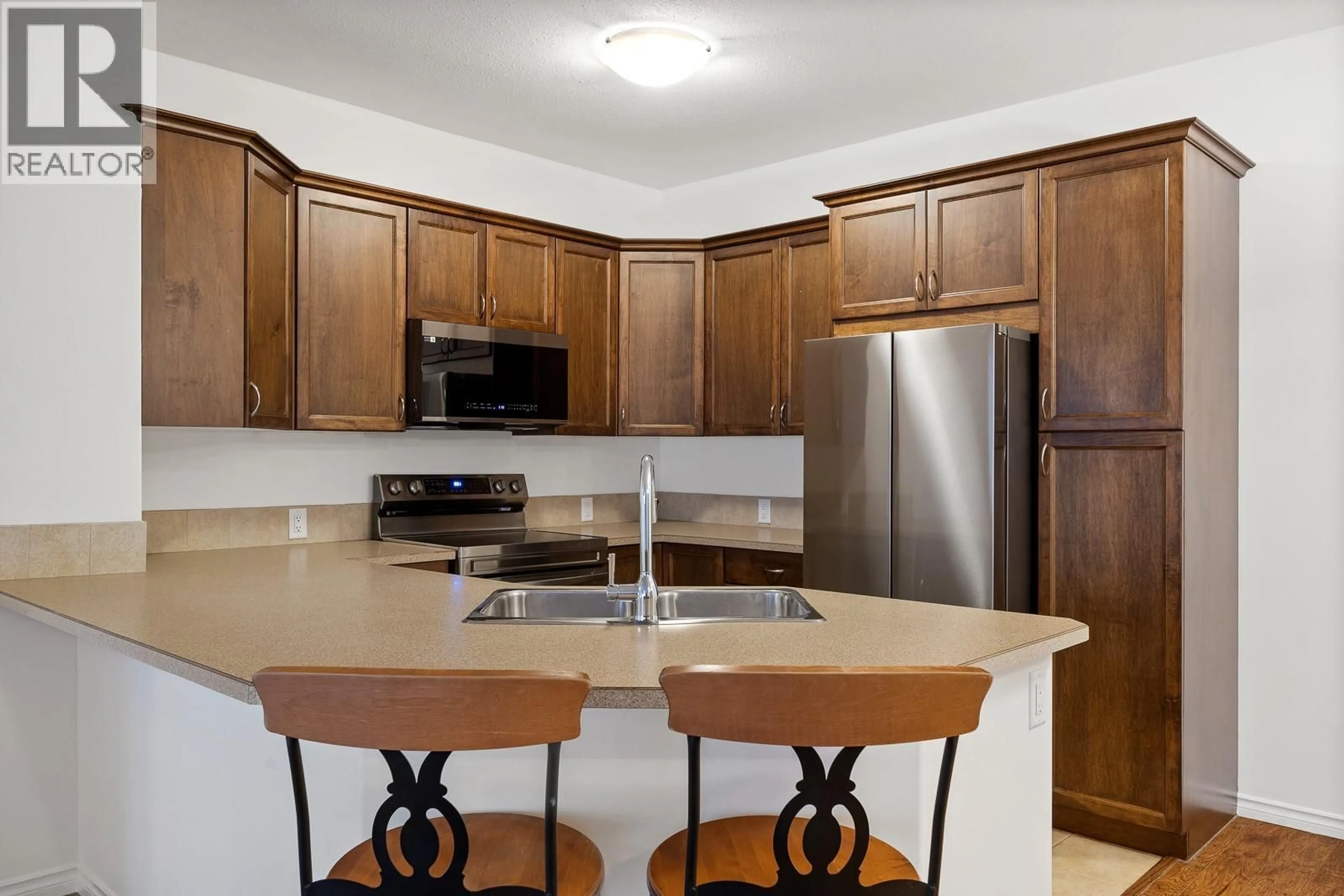 Standard kitchen, ceramic/tile floor for 104 - 1007 HARVEY AVENUE, Kelowna British Columbia V1Y6E4