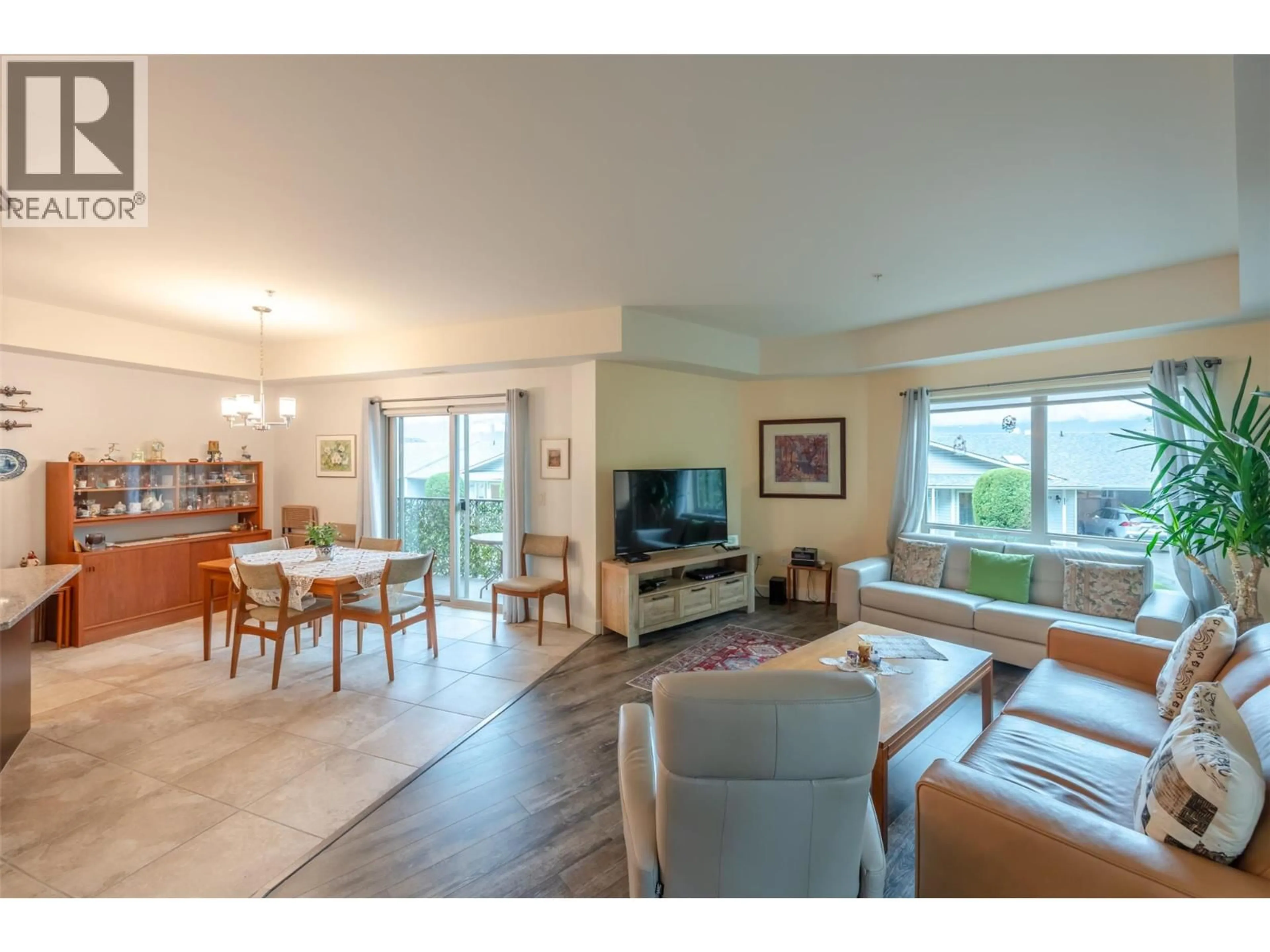 Living room with furniture, wood/laminate floor for 105 - 873 FORESTBROOK DRIVE, Penticton British Columbia V2A2E9