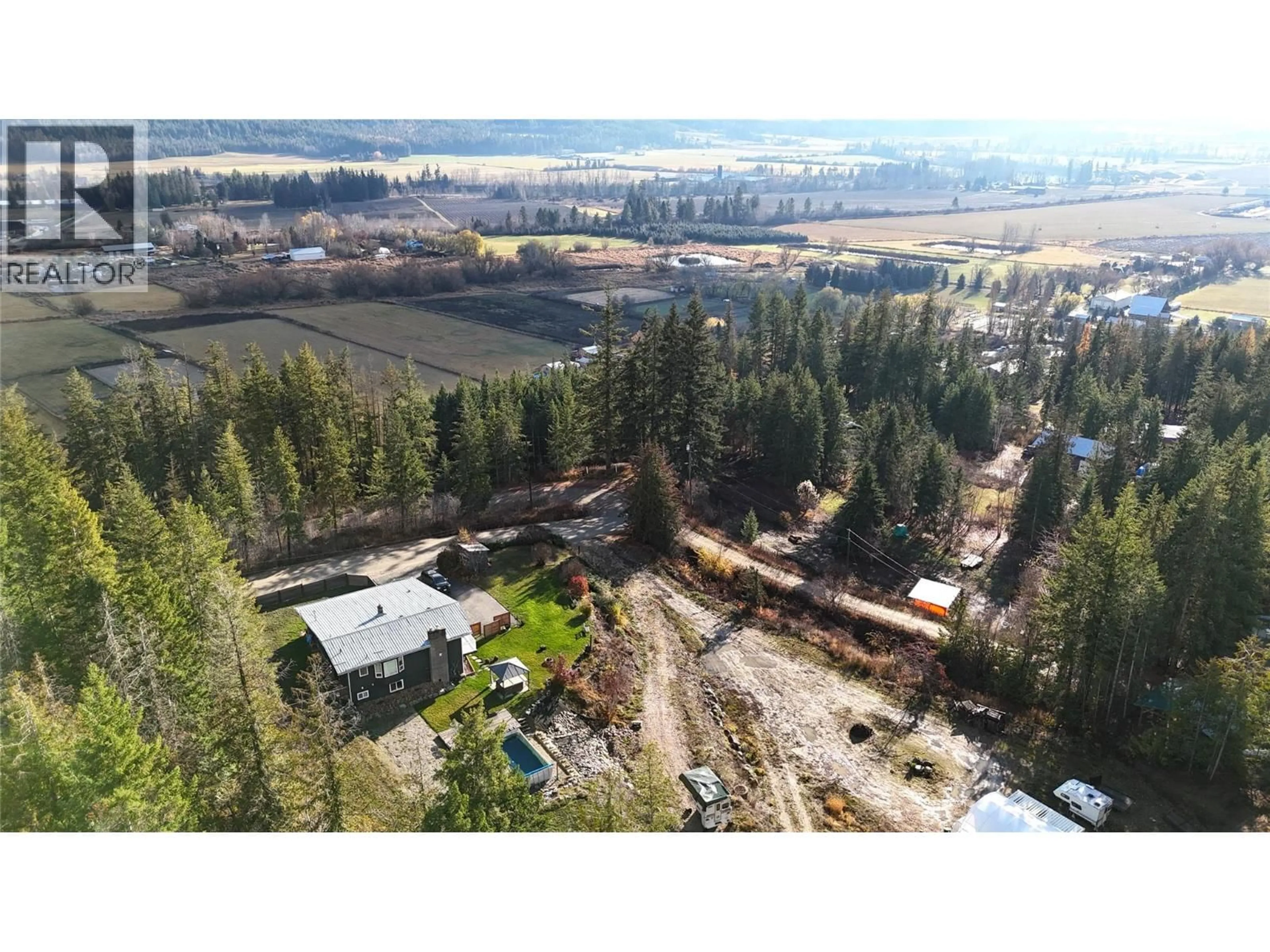 A pic from outside/outdoor area/front of a property/back of a property/a pic from drone, forest/trees view for 48 STROULGER ROAD, Enderby British Columbia V0E1V3