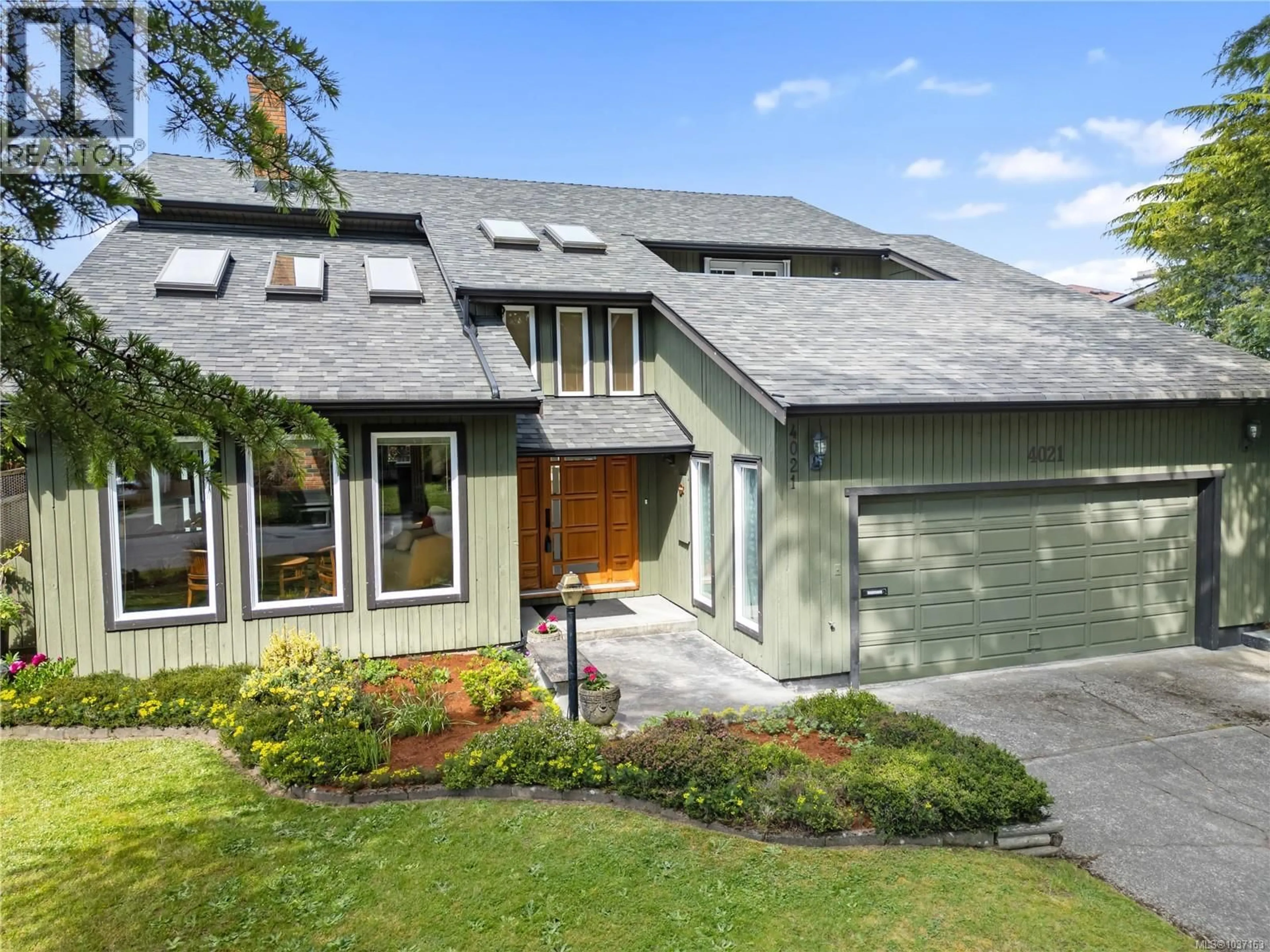 Home with brick exterior material, street for 4021 DAWNVIEW CRESCENT, Saanich British Columbia V8N5P7