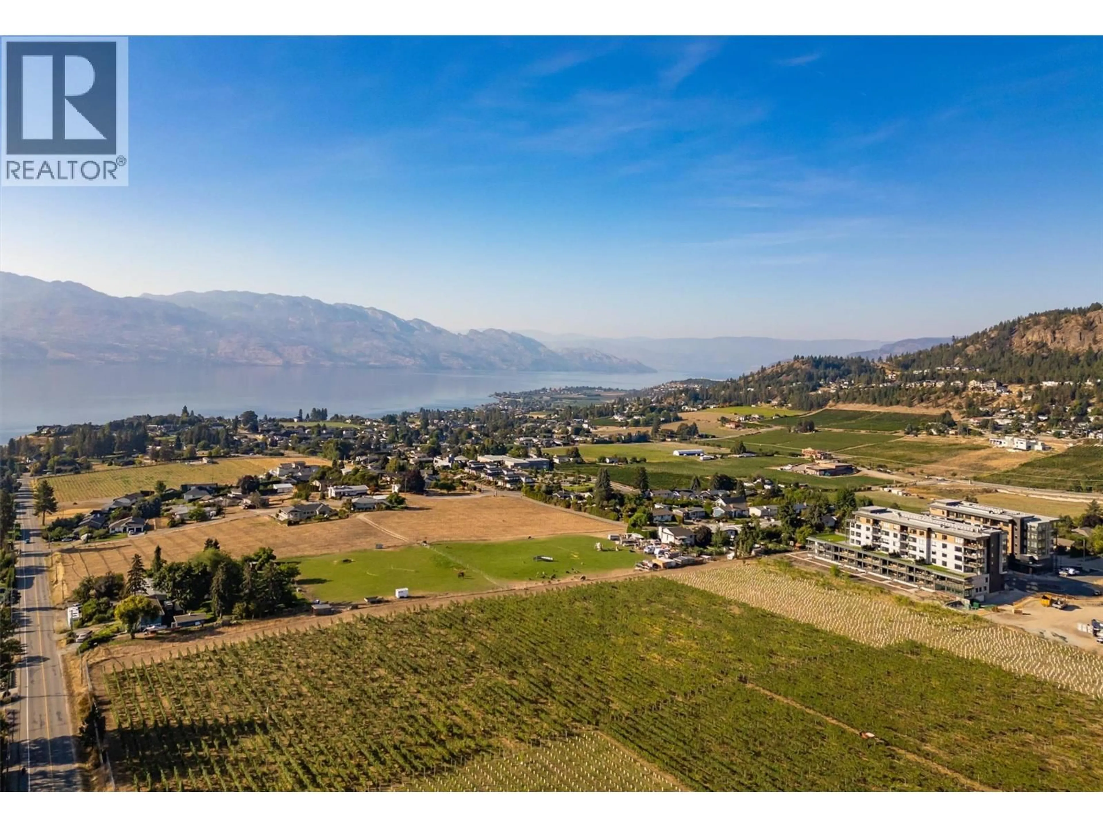 A pic from outside/outdoor area/front of a property/back of a property/a pic from drone, mountain view for 501 - 2760 OLALLA ROAD, West Kelowna British Columbia V1Z2A9
