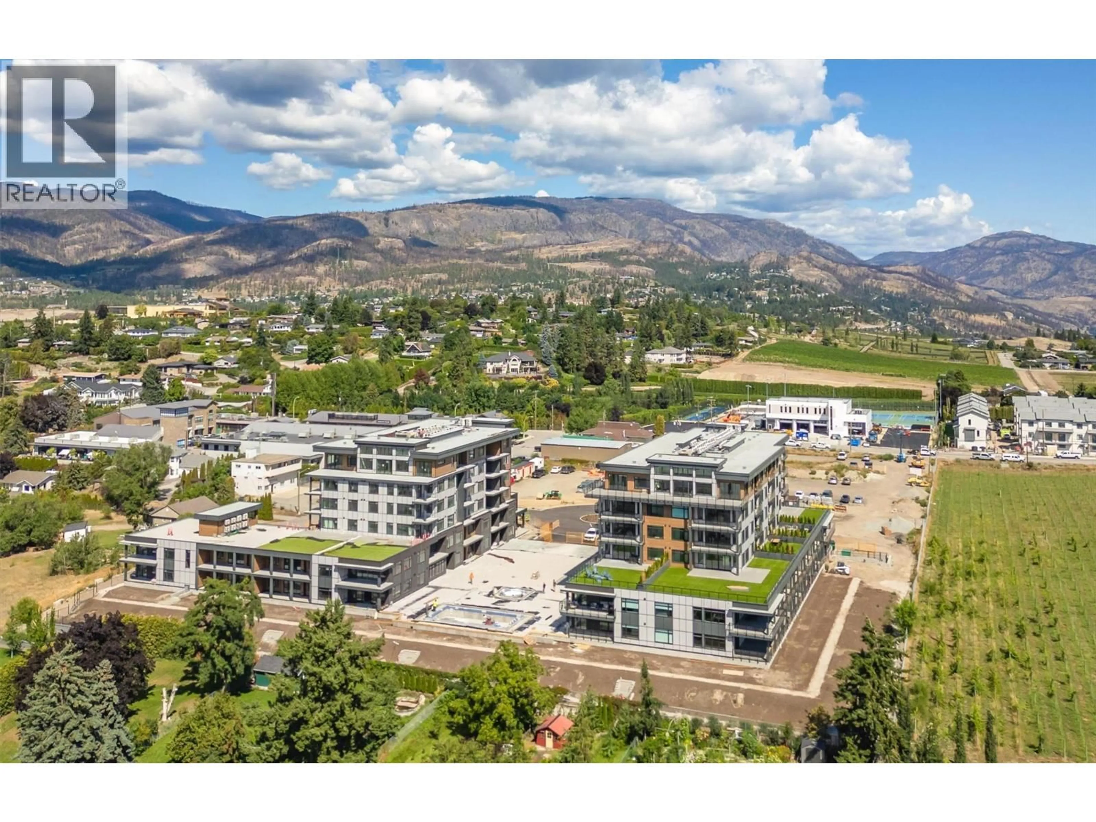 A pic from outside/outdoor area/front of a property/back of a property/a pic from drone, mountain view for 501 - 2760 OLALLA ROAD, West Kelowna British Columbia V1Z2A9