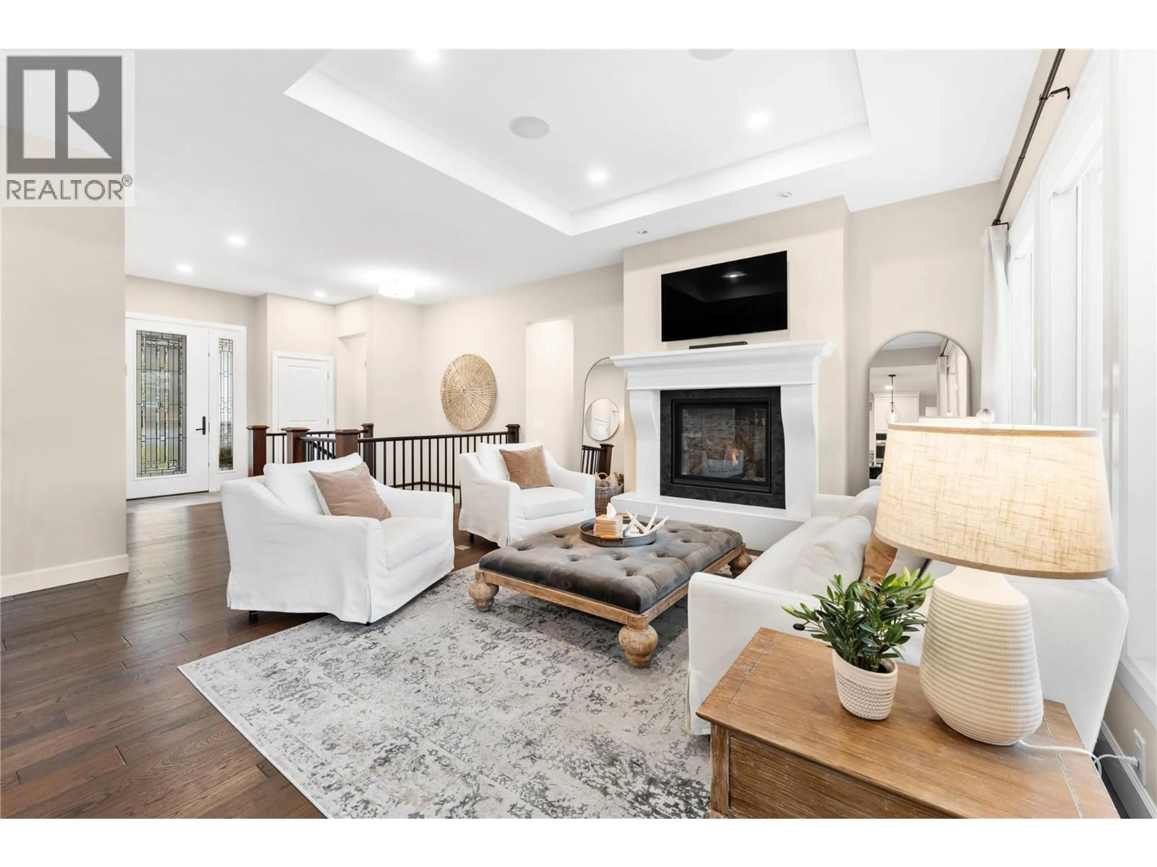 Living room with furniture, unknown for 216 LOST CREEK LANE, Kelowna British Columbia V1V3B6